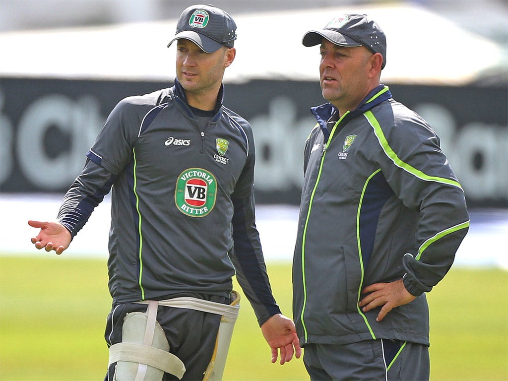 Australia captain Michael Clarke chats to new coach Darren Lehmann after a net at Taunton