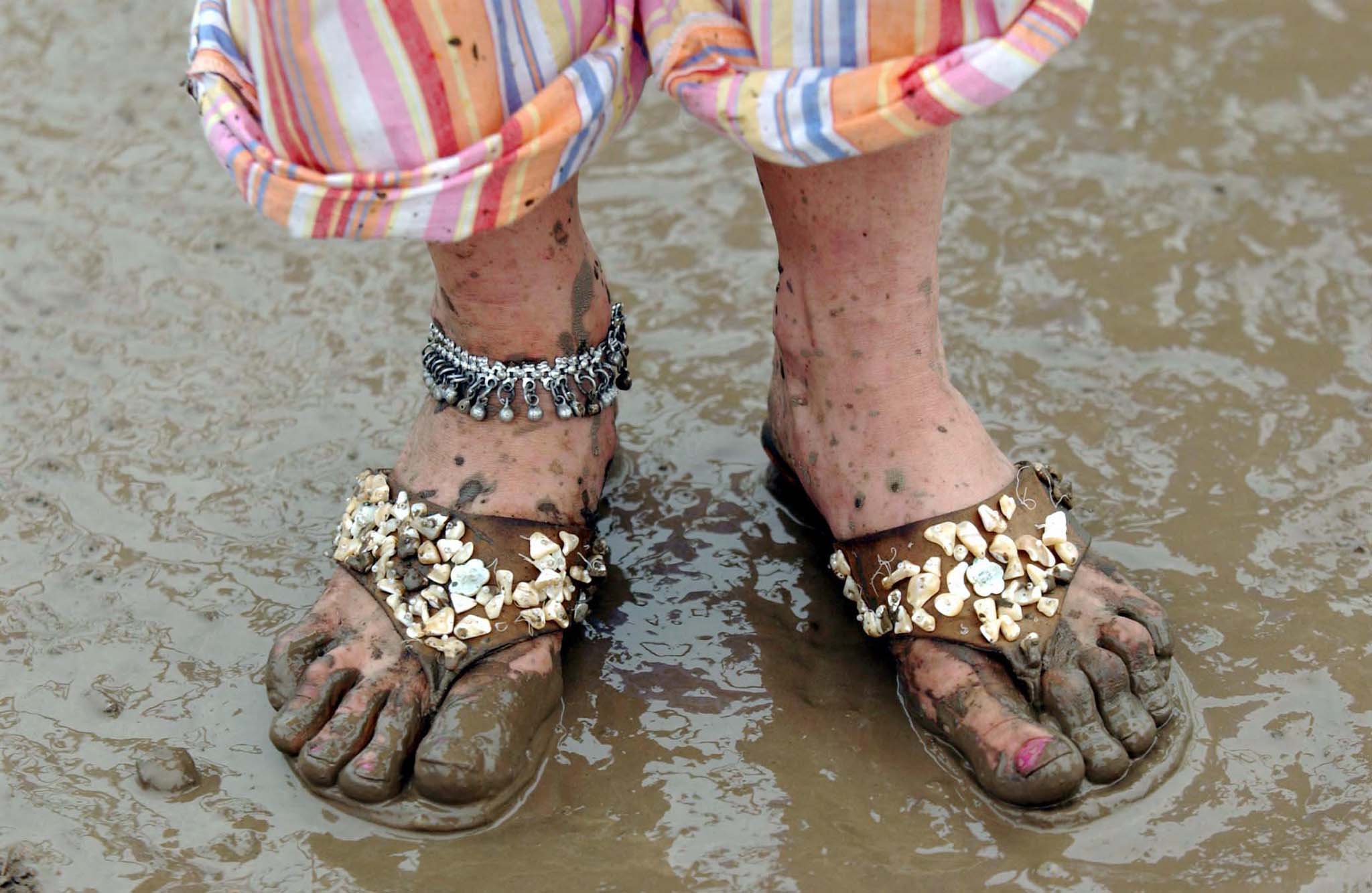 Mud and inappropriate footwear - always a visual delight but not as common a sight as you'd think, as most people prove annoyingly sensible. This is a shot I really need to keep my eyes out for.