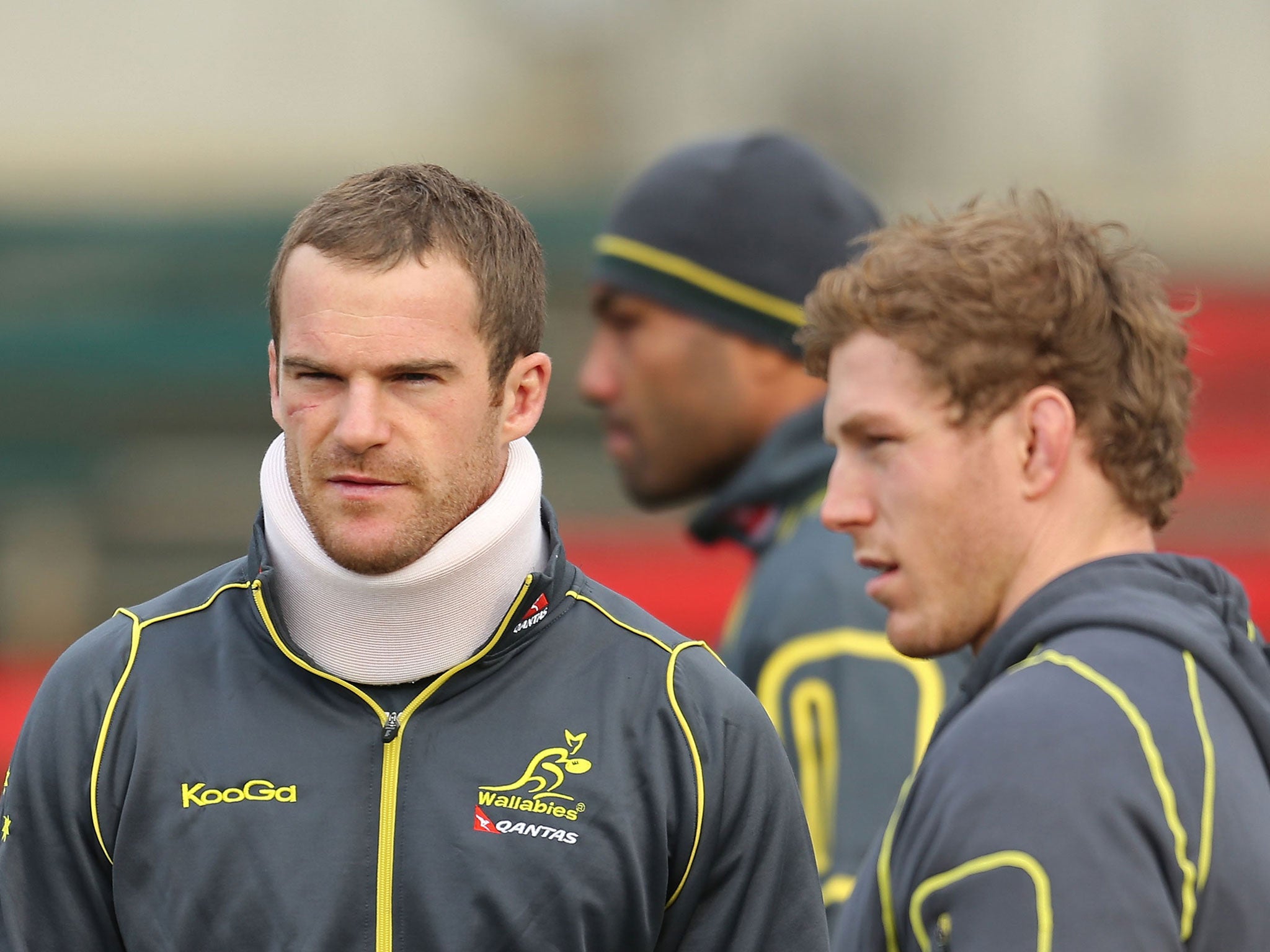 Pat McCabe (left) looks on during Australian training