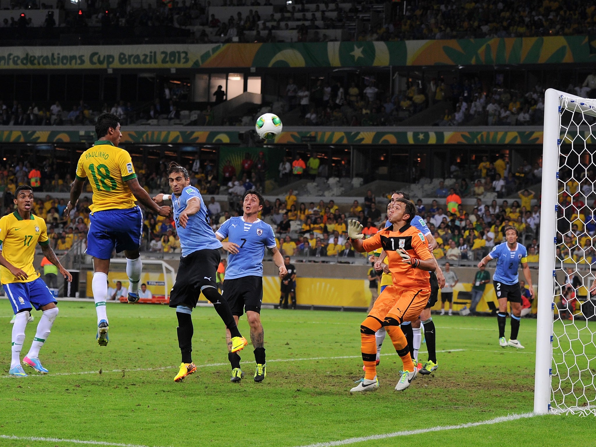 Paulinho of Brazil scores his team's second goal to make the score 2-1 during the FIFA Confederations Cup Brazil 2013 Semi Final match between Brazil and Uruguay