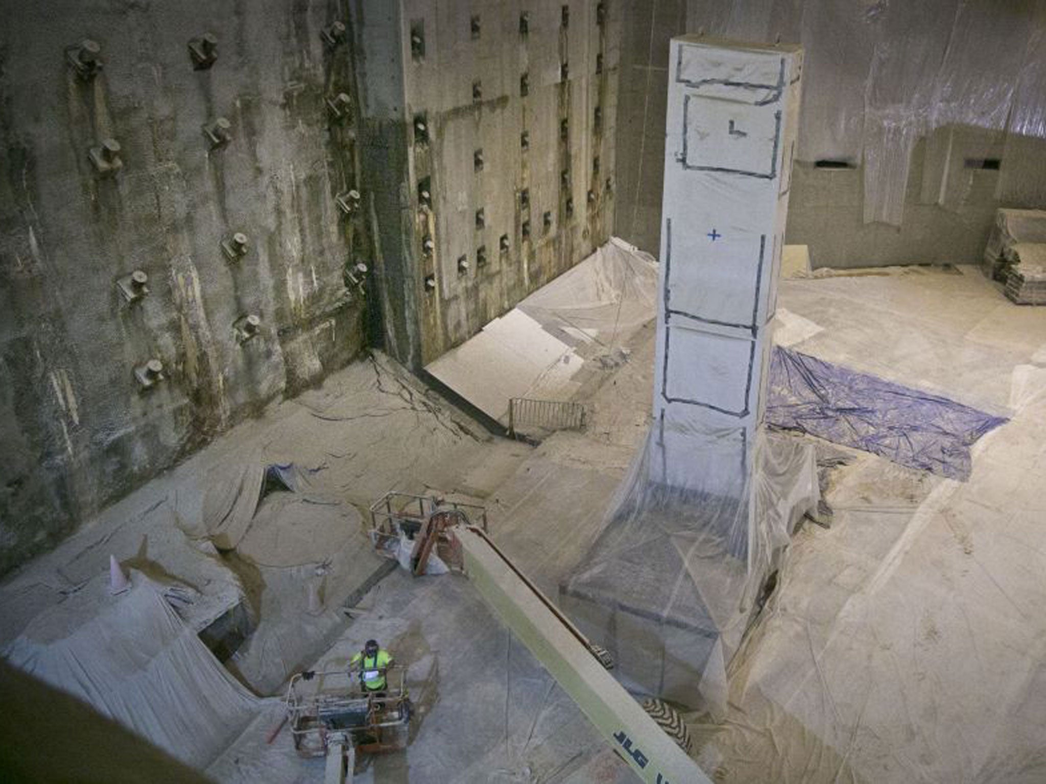 The Slurry Wall, left, part of the World Trade Centerís original foundation, is shown during ongoing construction at the 911 Memorial Museum