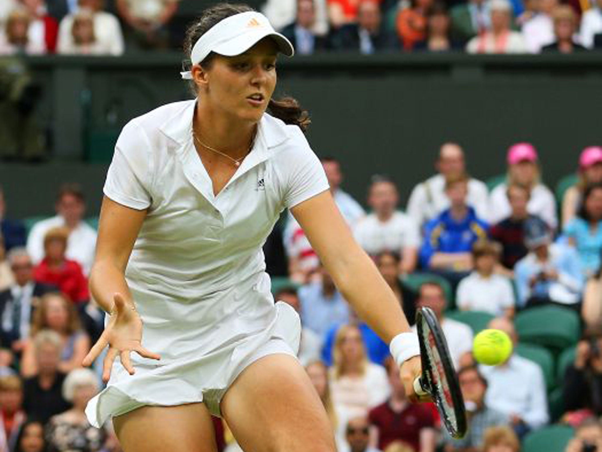 Laura Robson volleys a return during her 6-4, 6-1 victory over Mariana Duque-Marino