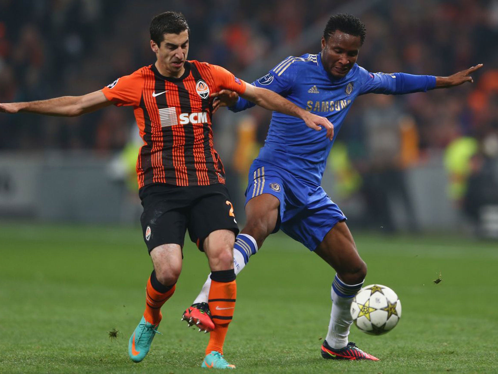 Henrikh Mkhitaryan (left) takes on Chelsea’s John Obi Mikel in 2012