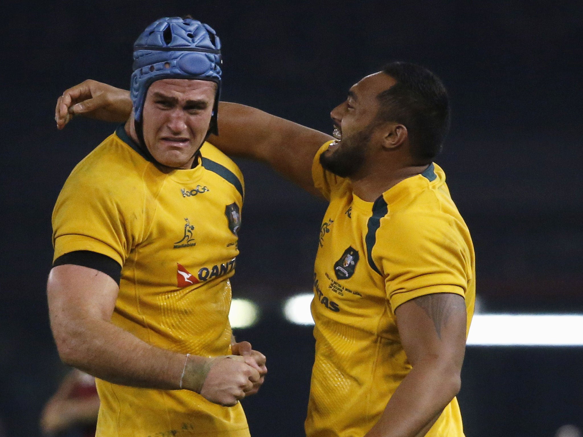 Ending in tears: James Horwill is emotional as Sekope Kepu hugs him