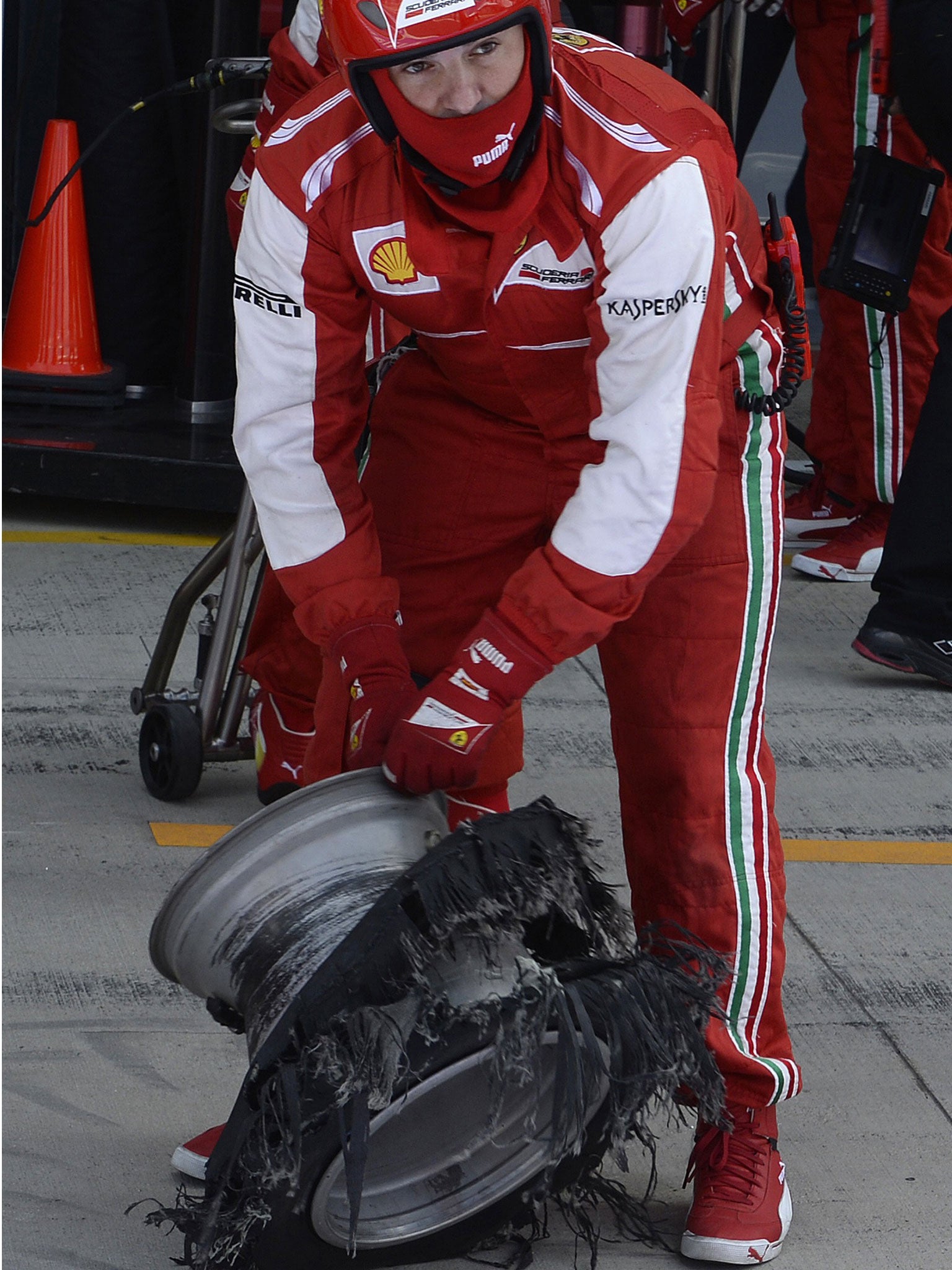 The punctured tyre of Ferrari Formula One driver Felipe Massa of Brazil