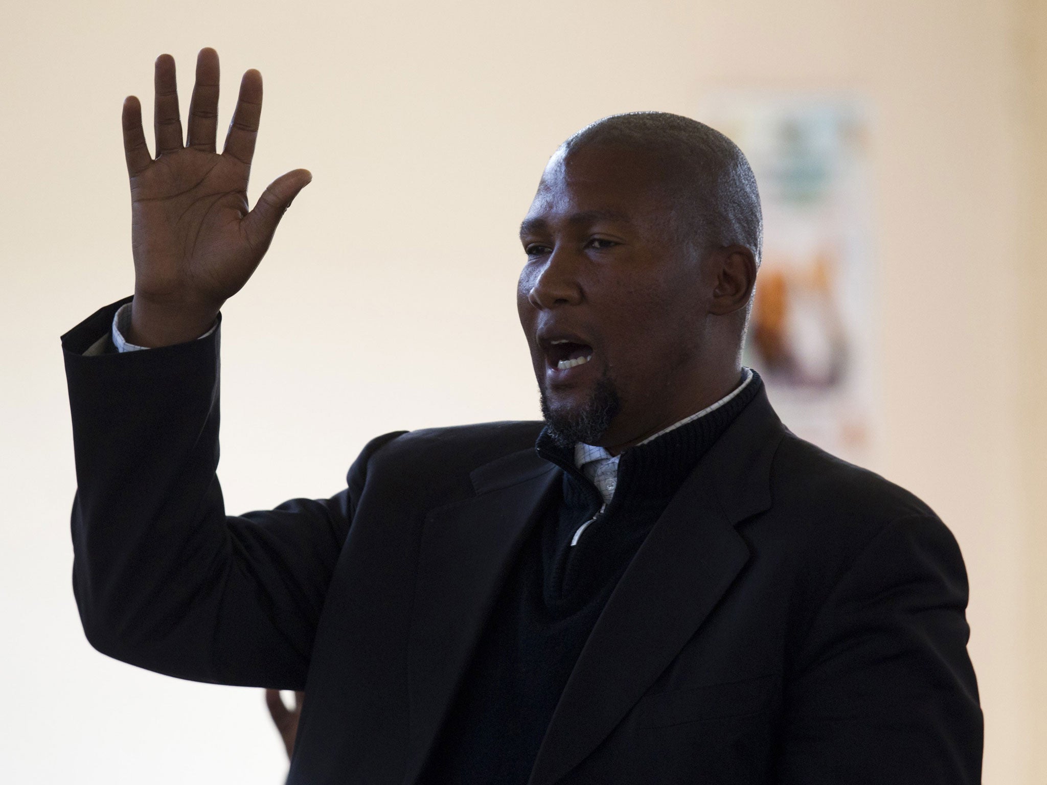 Mandla Mandela, pictured, had five of Nelson Mandela's dead relatives relocated to his own village in Mvezo. Other Mandela family members want them returned to Qunu