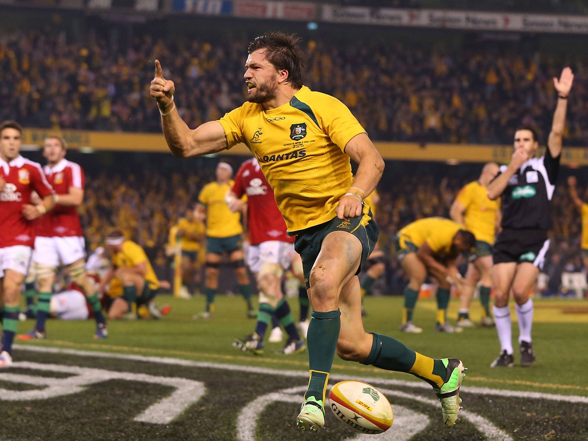 Adam Ashley-Cooper celebrates scoring the match-winning try