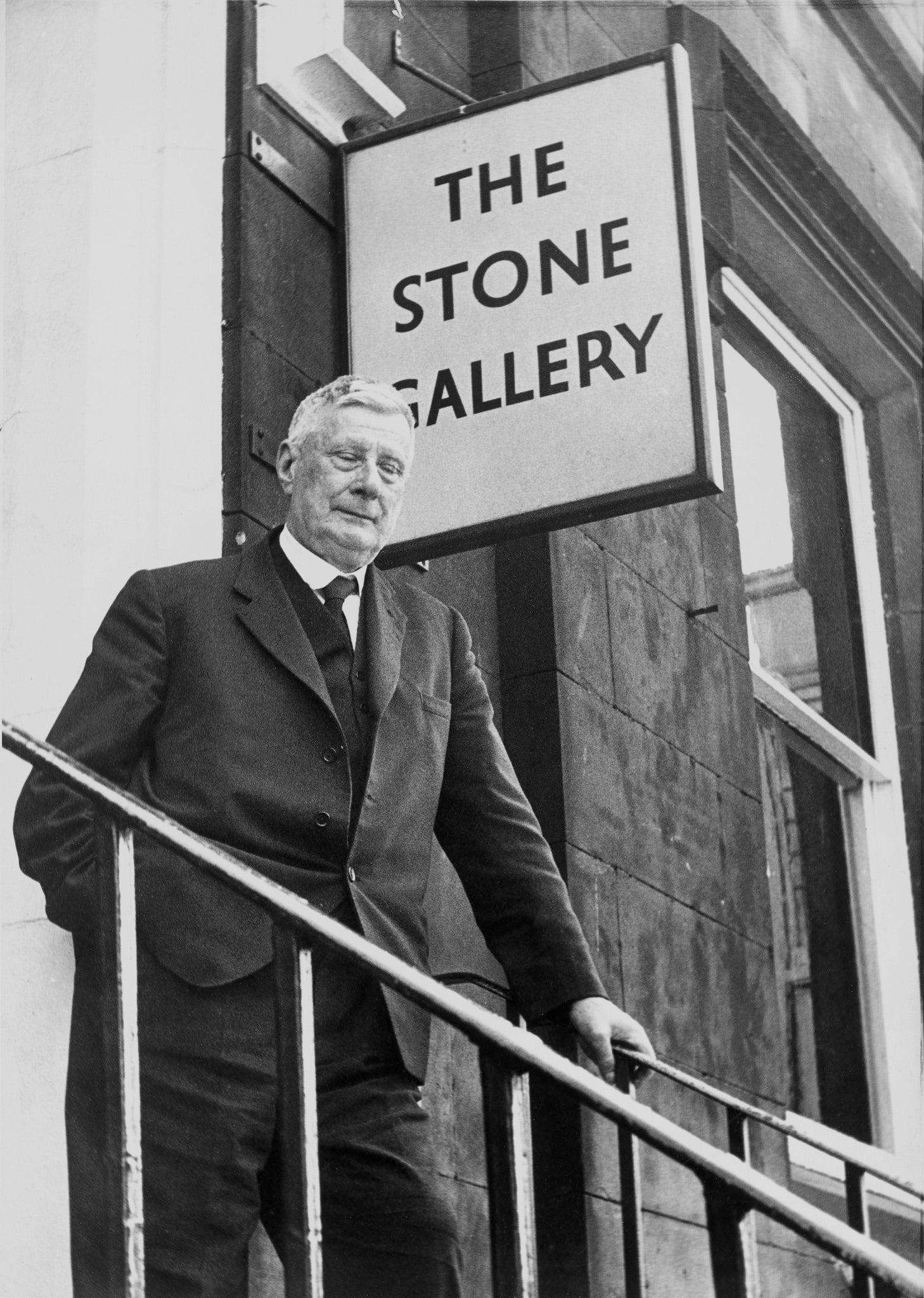 Lowry on the steps of the Stone Gallery, 10 St. Marys Place, Newcastle upon Tyne.