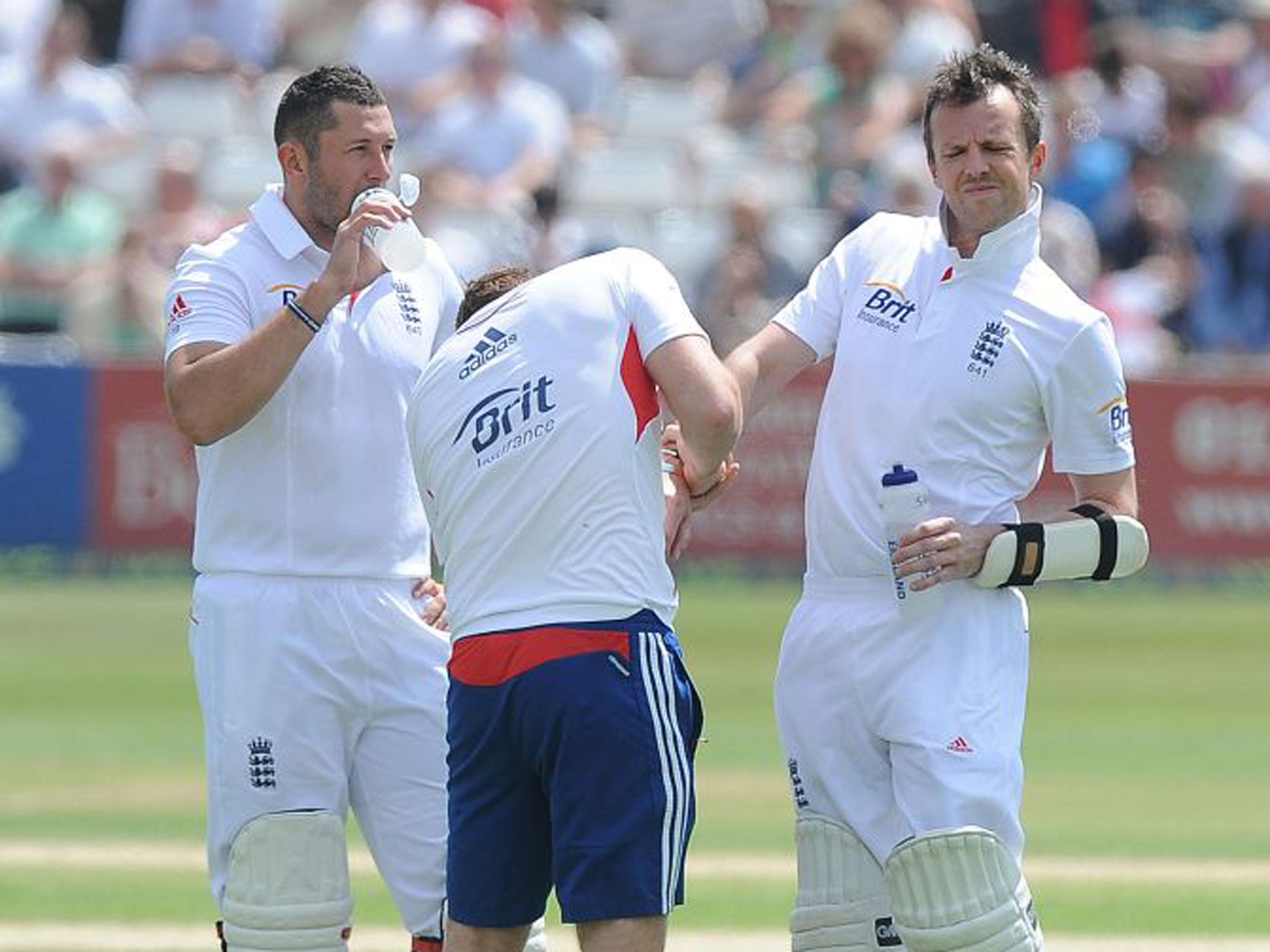 England’s Graeme Swann was given treatment after taking a ball to his forearm