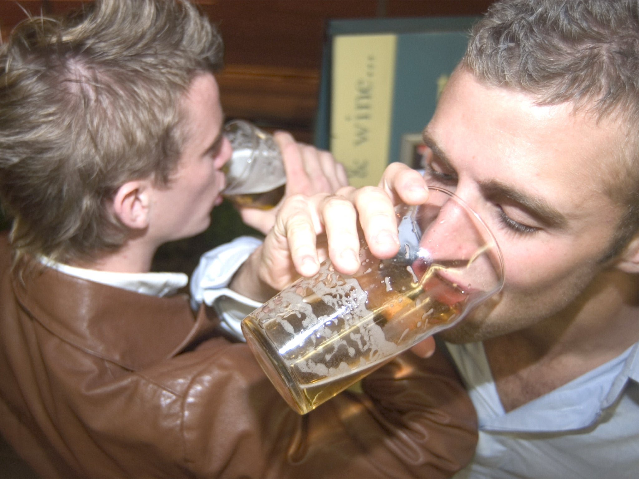 Two lads partake in boozy banter