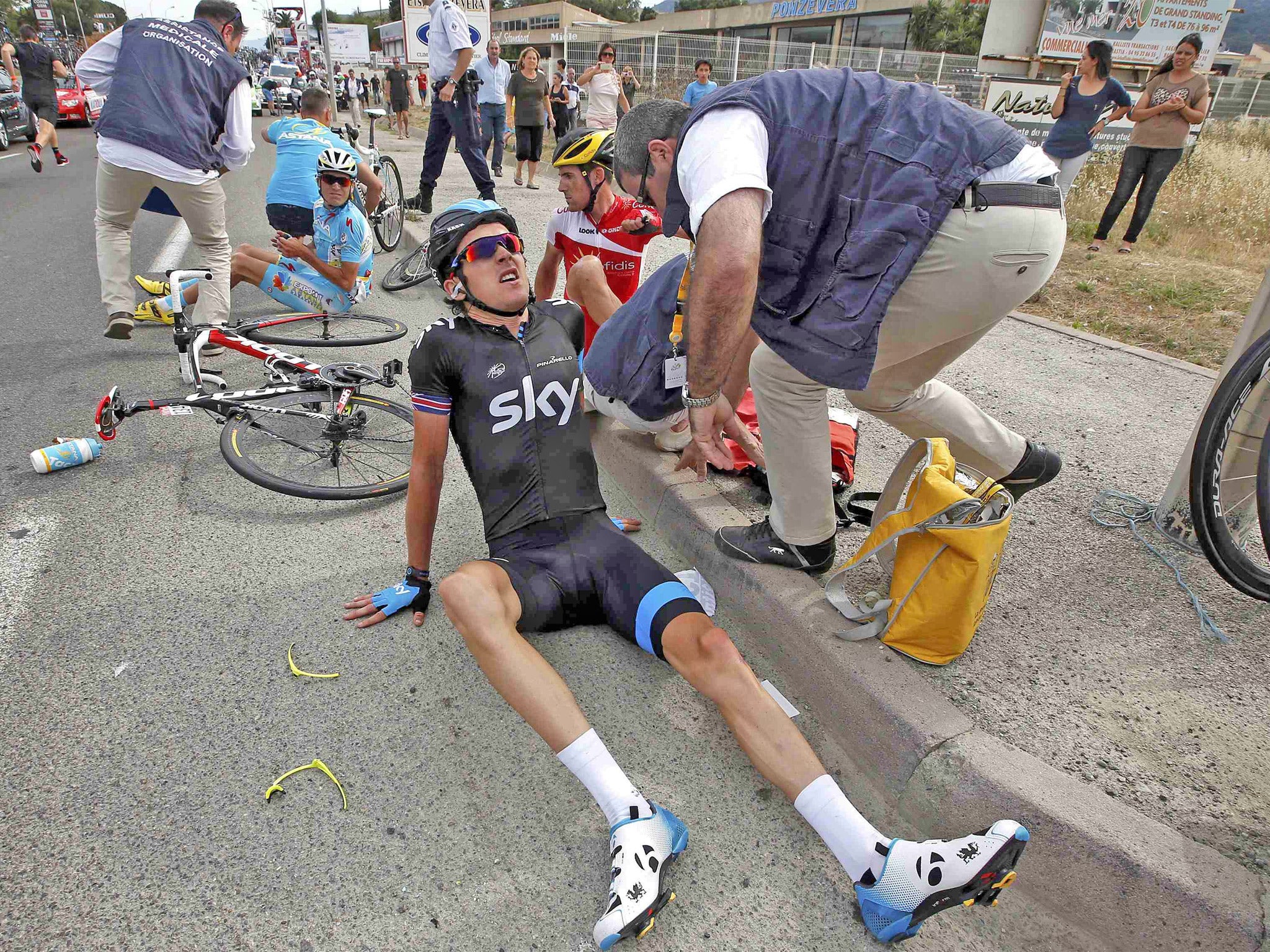Tough spokes: Geraint Thomas after his fall on Saturday