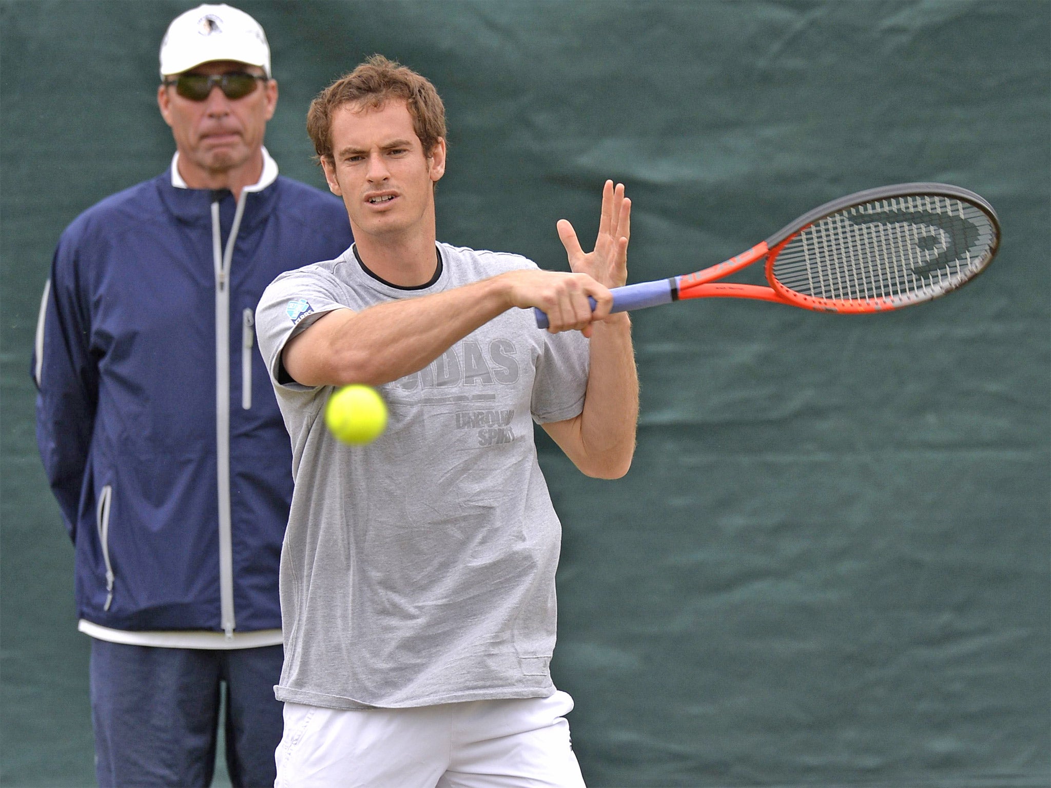 Andy Murray prepares for his quarter-final watched by coach Ivan Lendl