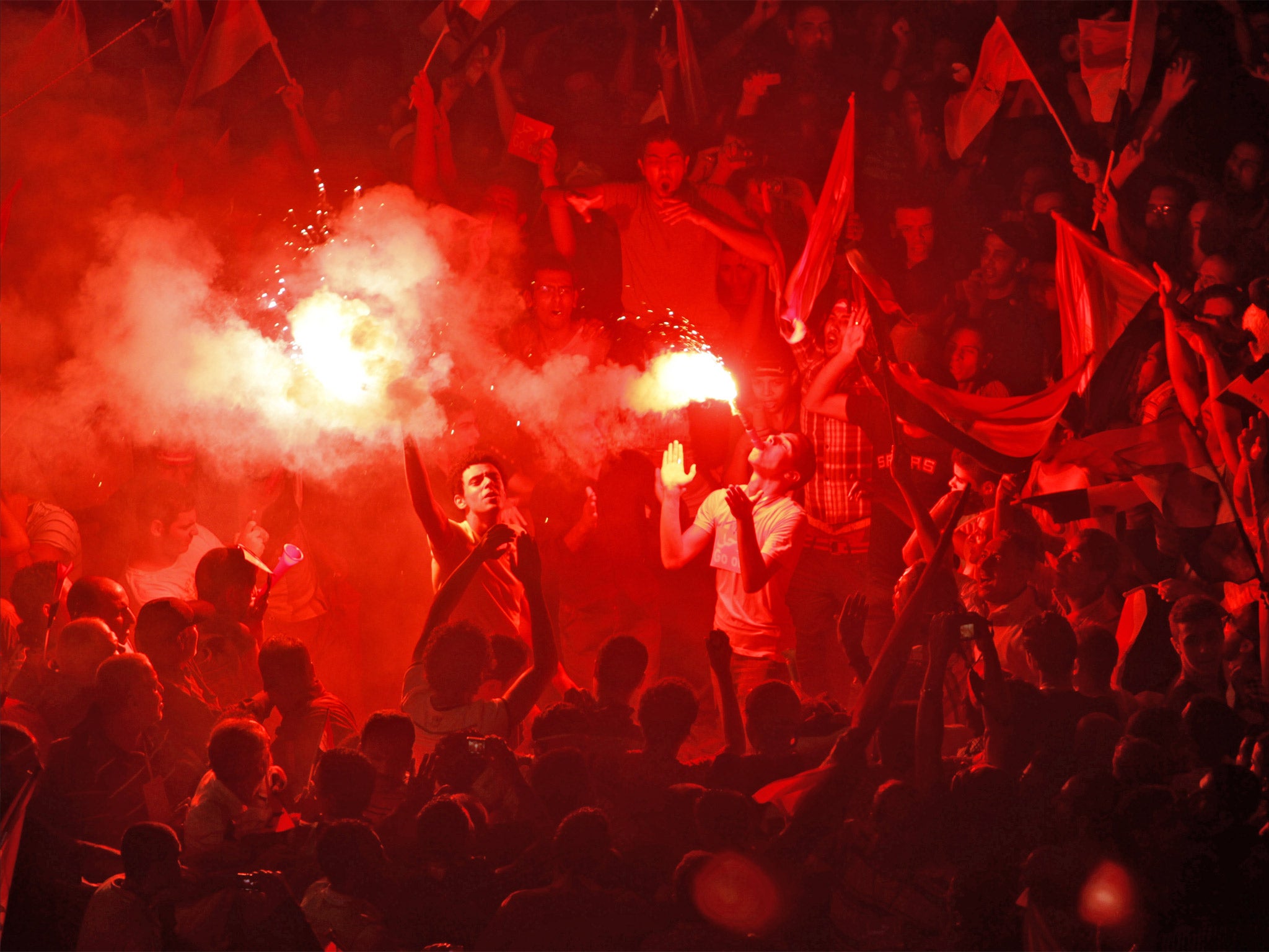 Opponents of Mohammed Morsi in protests leading up to the 2013 coup in Cairo