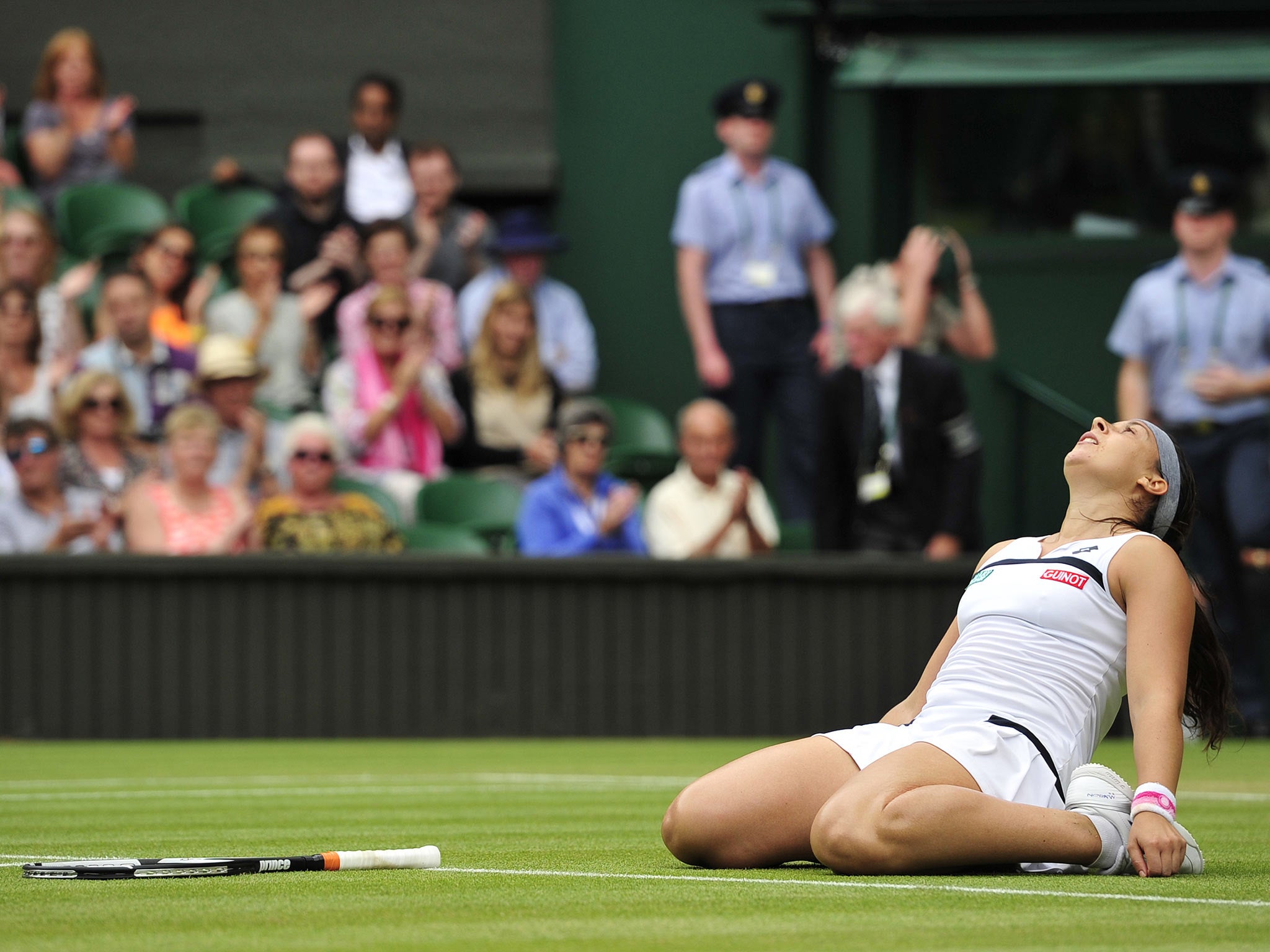 Marion Bartoli celebrates her semi-final victory