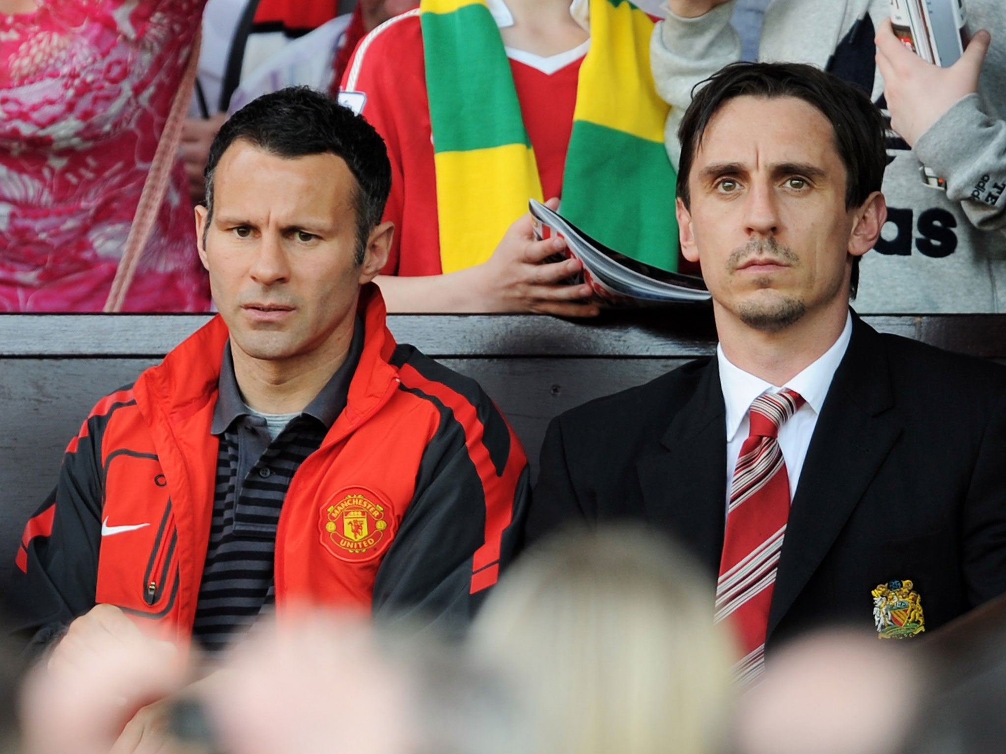 Ryan Giggs and Gary Neville, pictured in 2011, to open a football-themed hotel and a restaurant