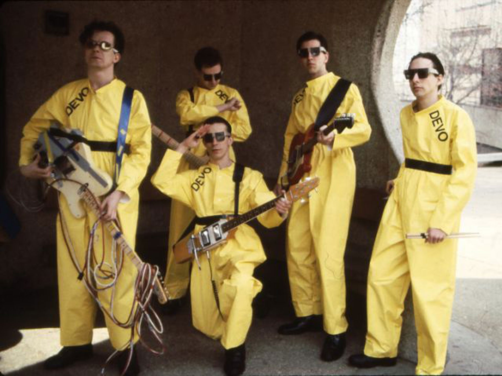 Mark Mothersbaugh, Bob Mothersbaugh (kneeling), Jerry and Bob Casale and Myers