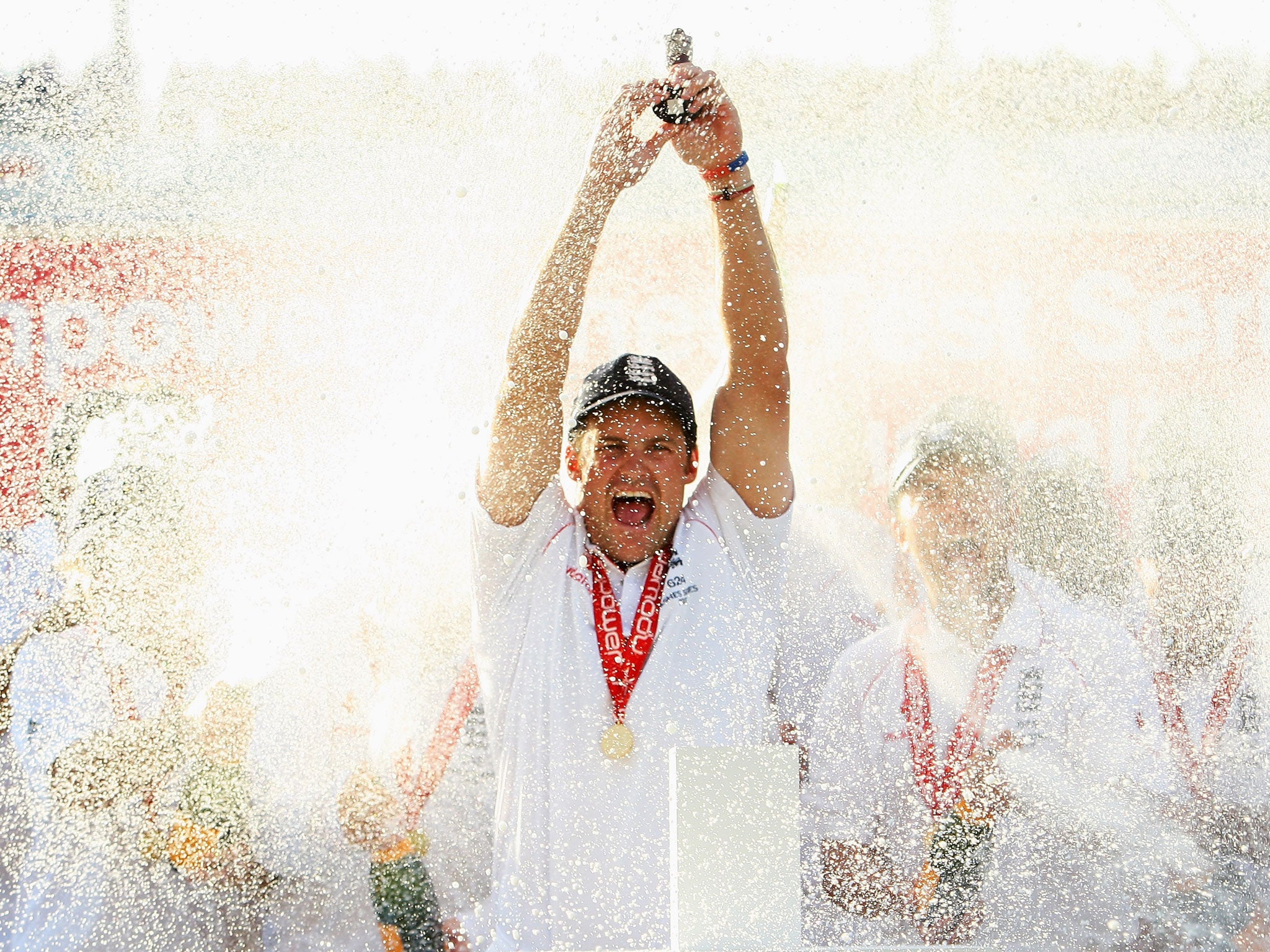 Long to reign: Andrew Strauss lifts the Ashes at The Oval in 2009. Another series win would give England their first hat-trick since 1956