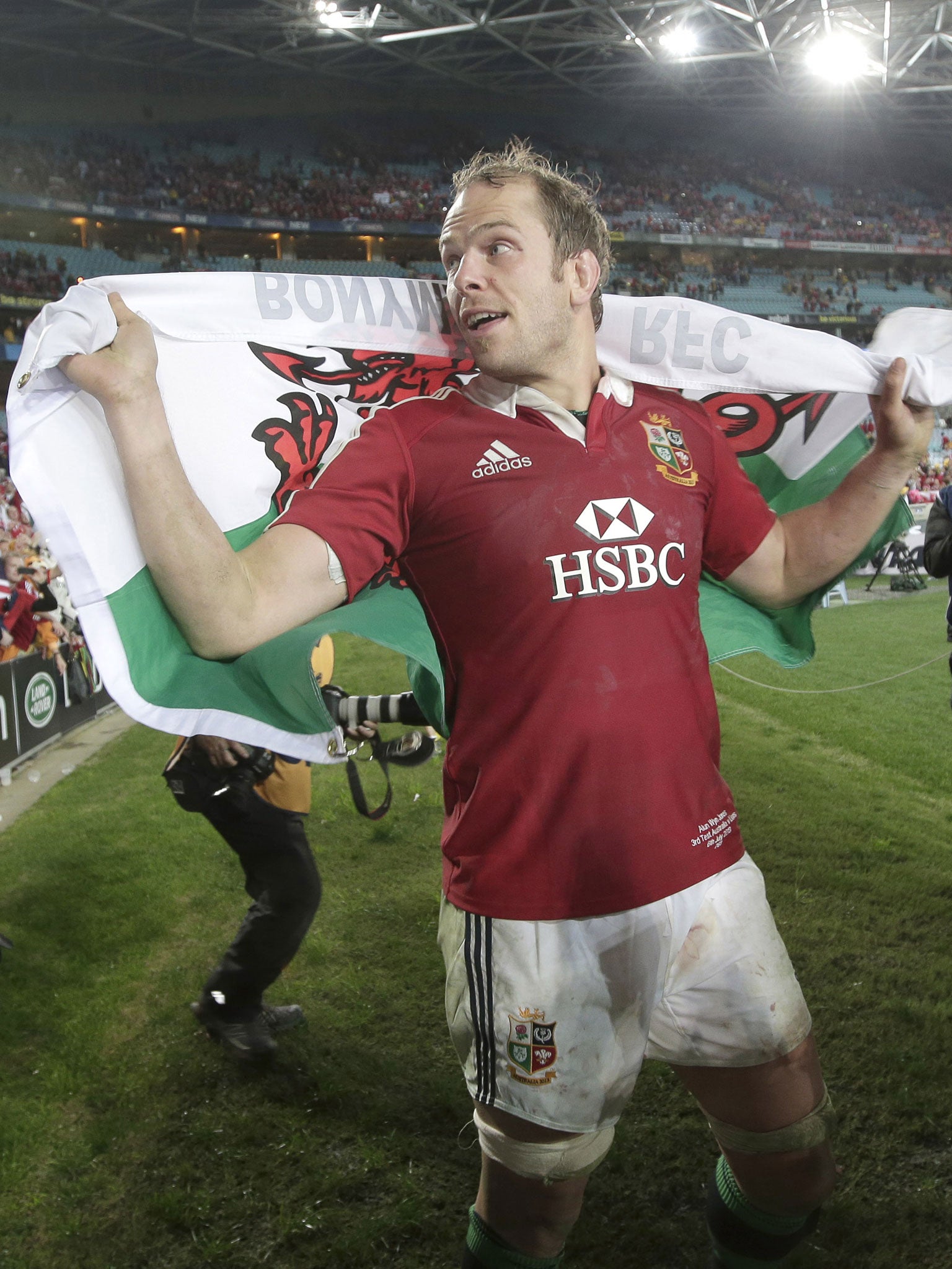 Lions captain Alun Wyn Jones flies the Welsh flag in Sydney