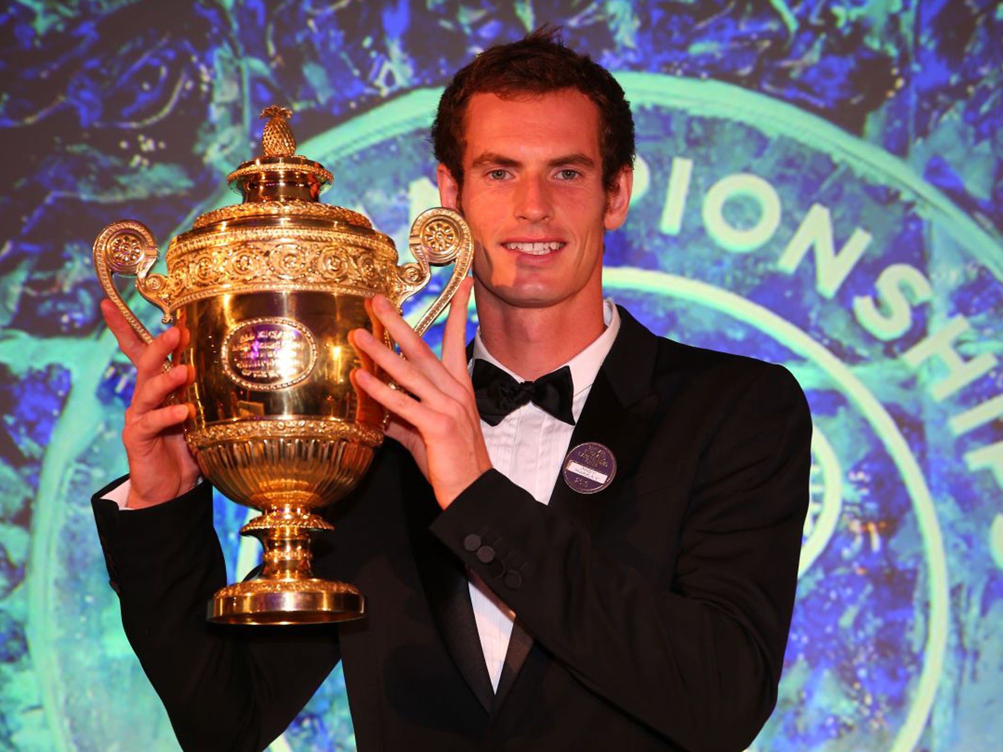 Andy Murray of Great Britain poses with his Trophy during the Wimbledon Championships 2013 Winners Ball (Julian Finney/Getty Images)