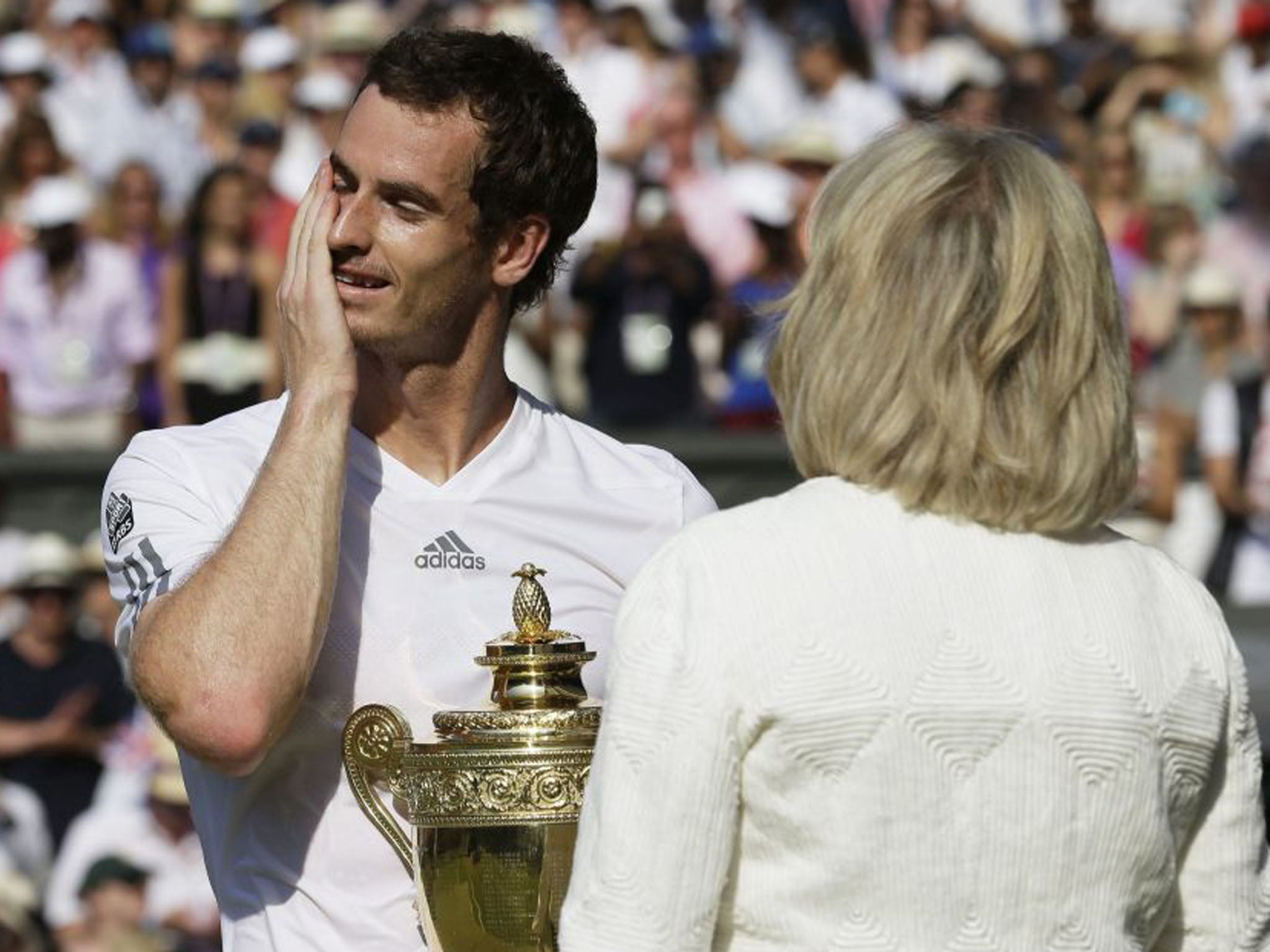 Andy Murray reflects during his post-match interview with the BBC's Sue Barker (Anja Niedringhaus/EPA)