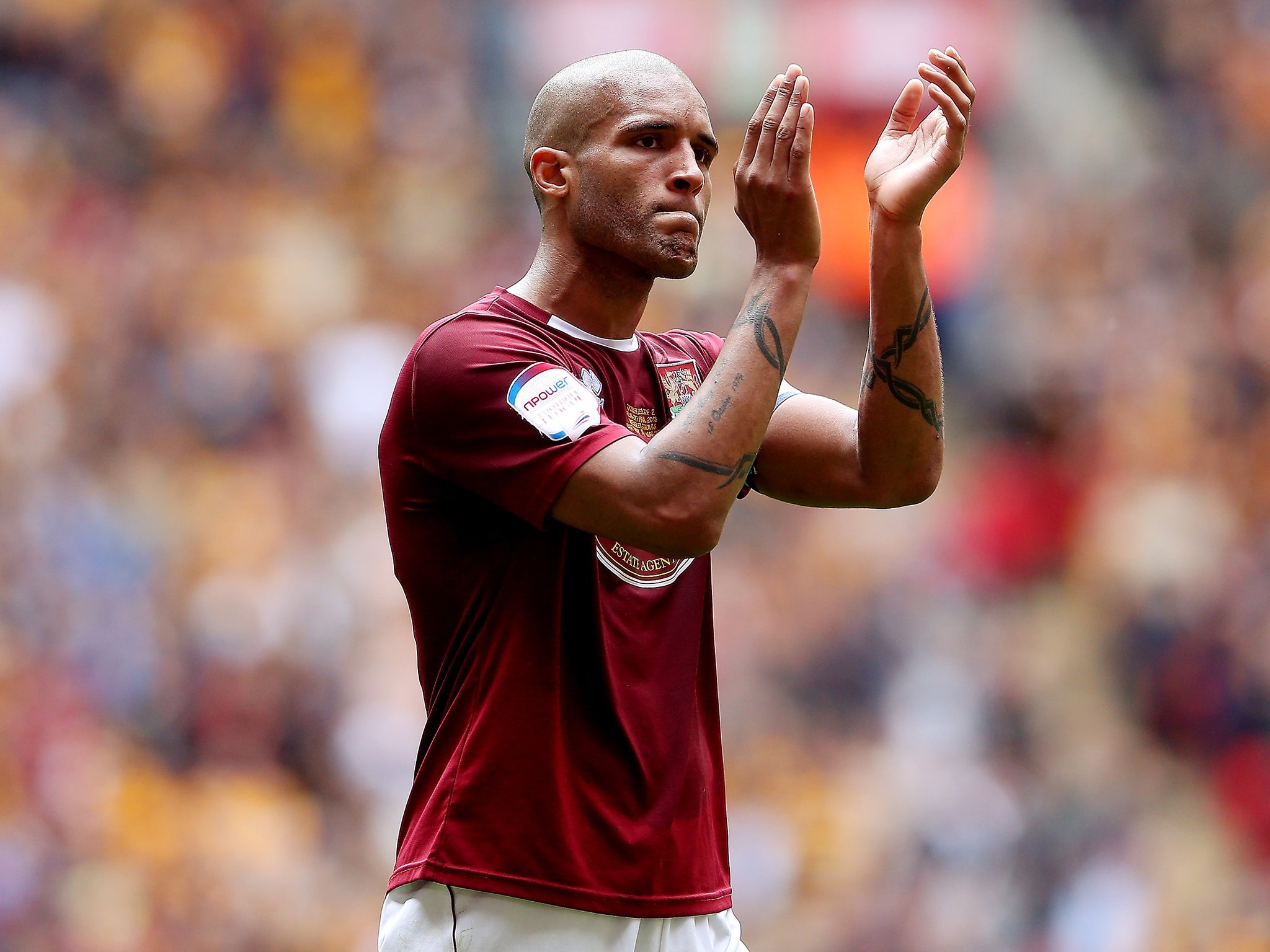 Current support for players is 'wholly inadequate,' Clarke Carlisle claims