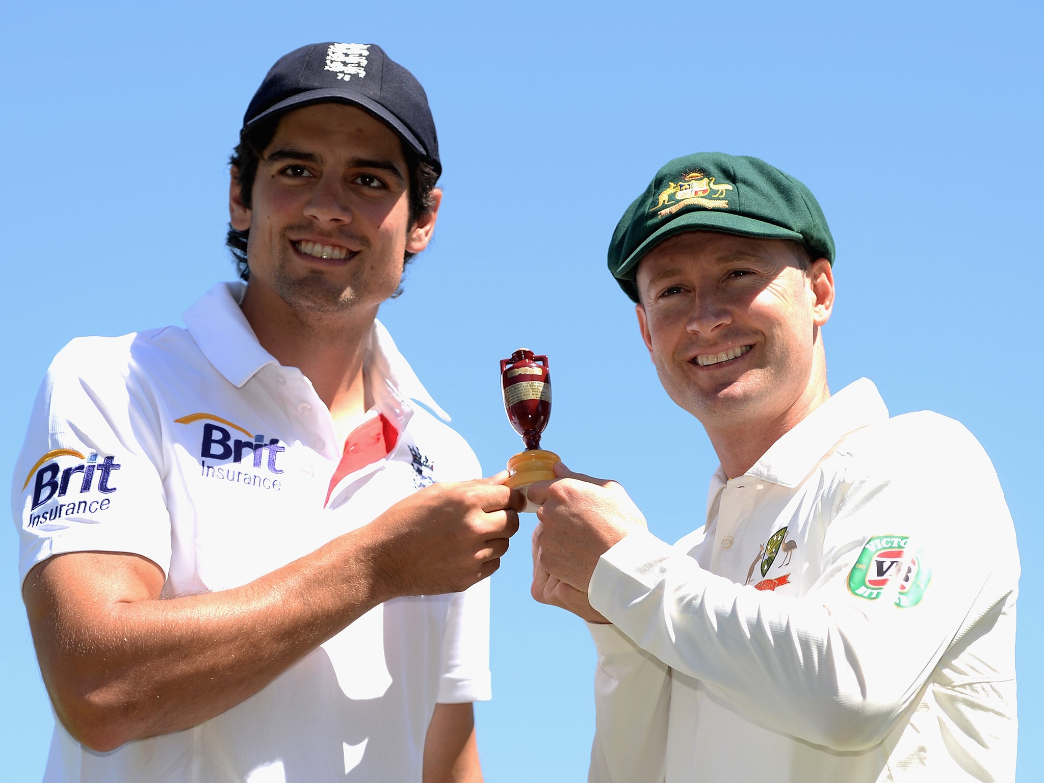 England captain Alastair Cook and Australia captain Michael Clarke pose with the Ashes urn