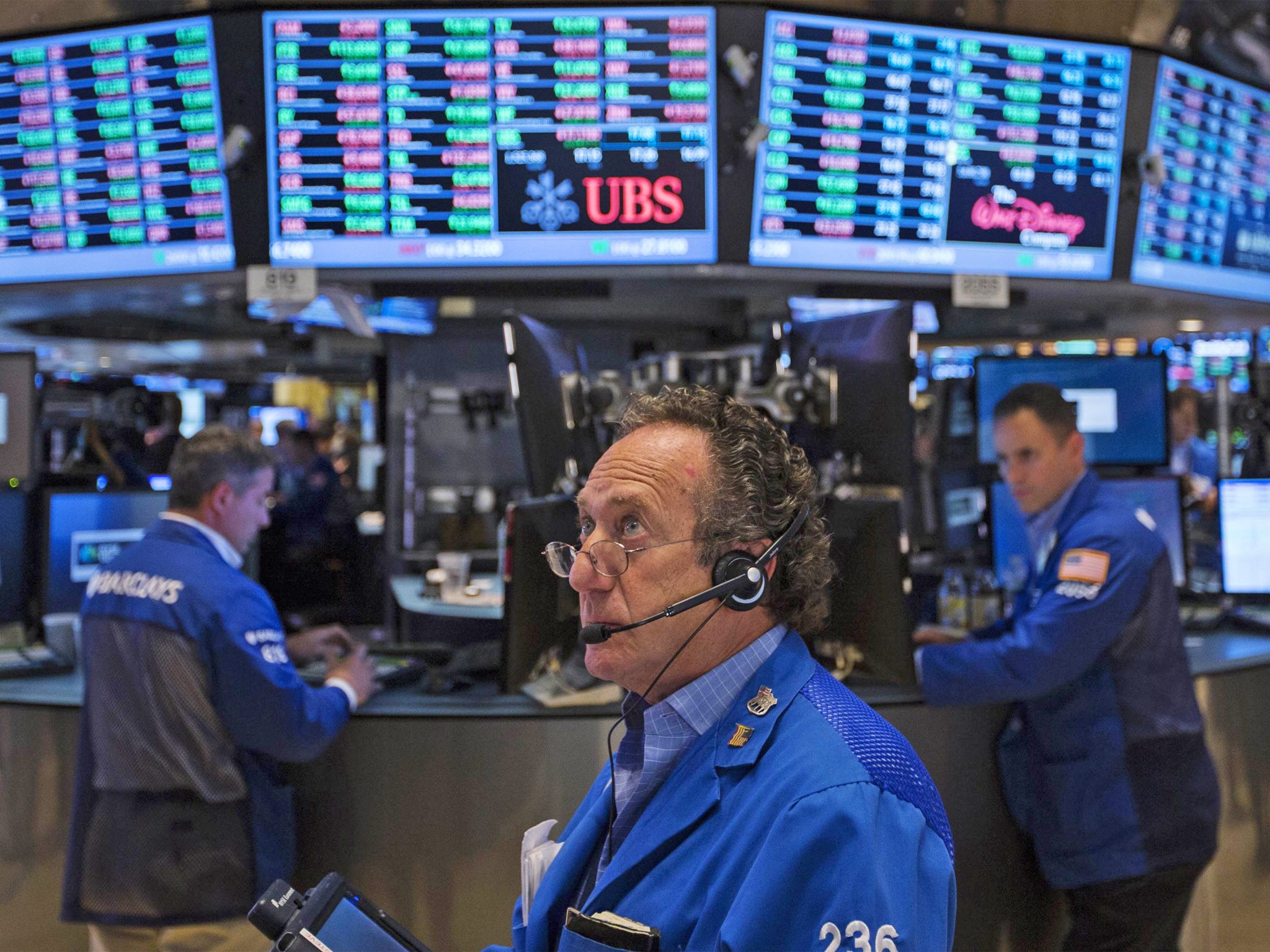 A trader works on the floor of the New York Stock Exchange