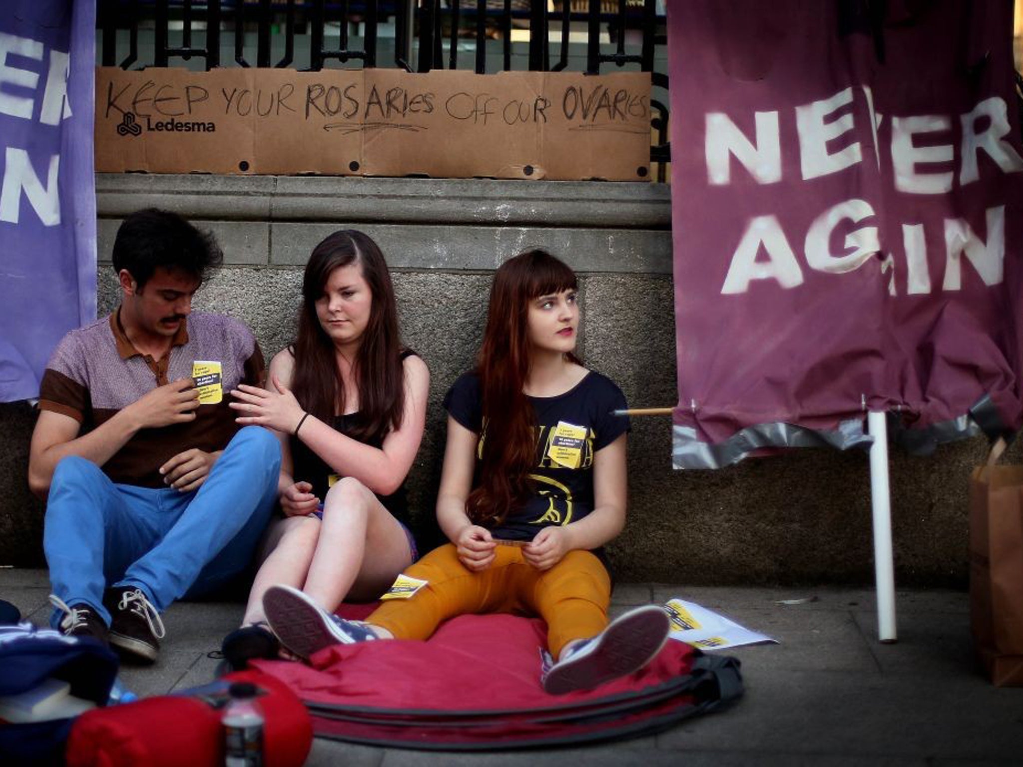 Members of the pro-choice movement group protest outside Leinster House in Dublin ahead of the abortion legislation vote