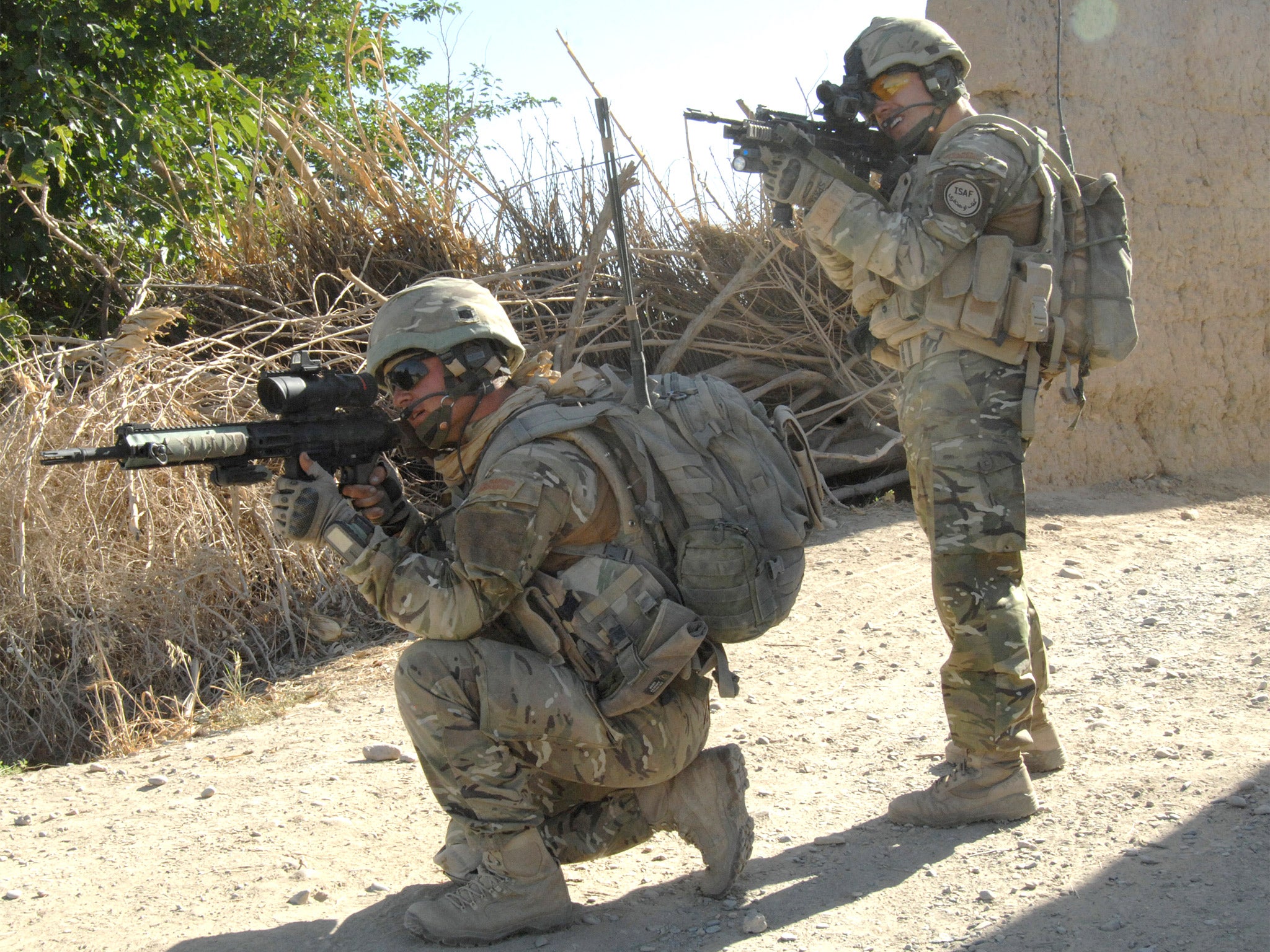 British troops wearing body armour in Afghanistan