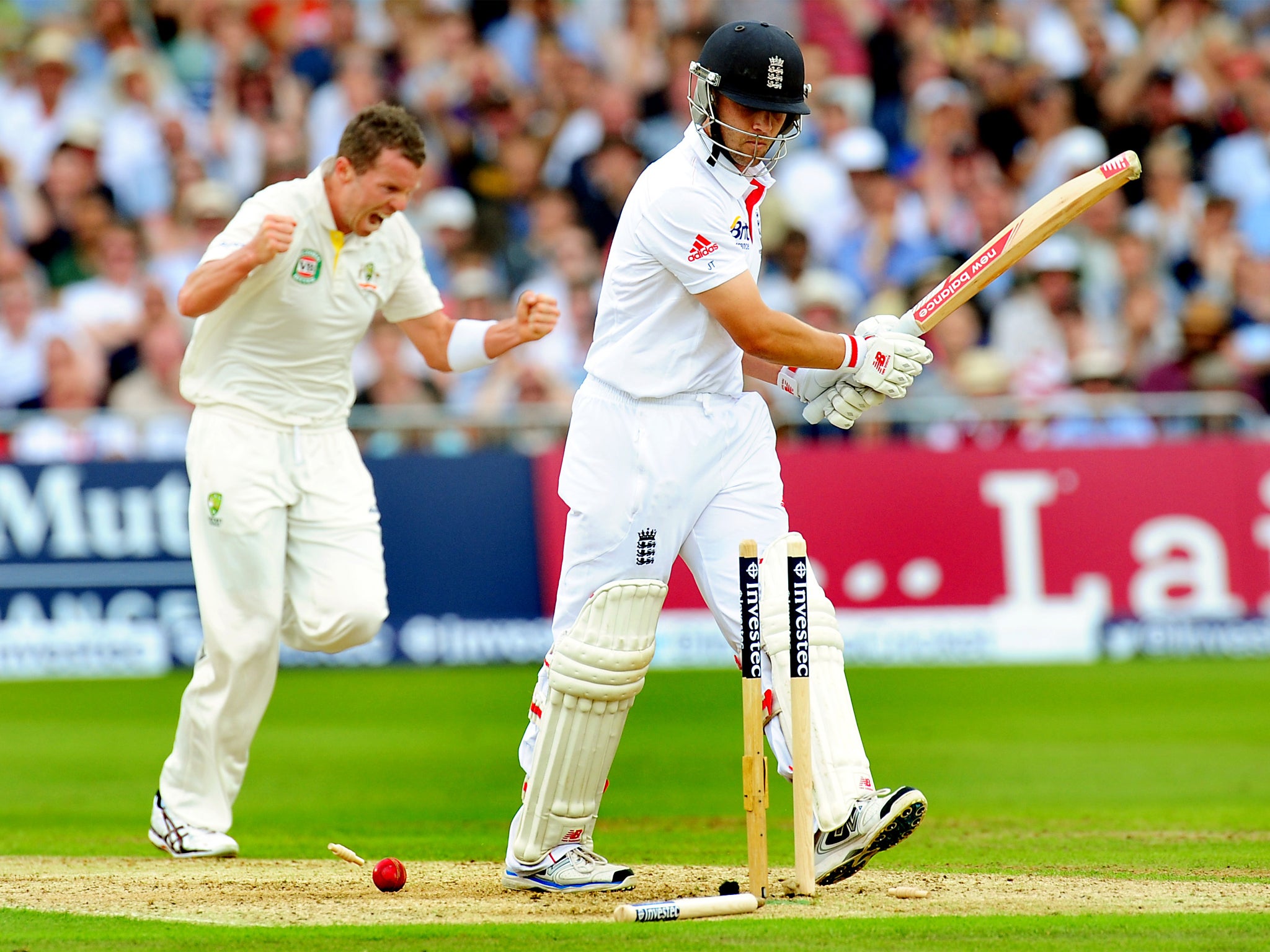 Peter Siddle celebrates dismissing Jonathan Trott