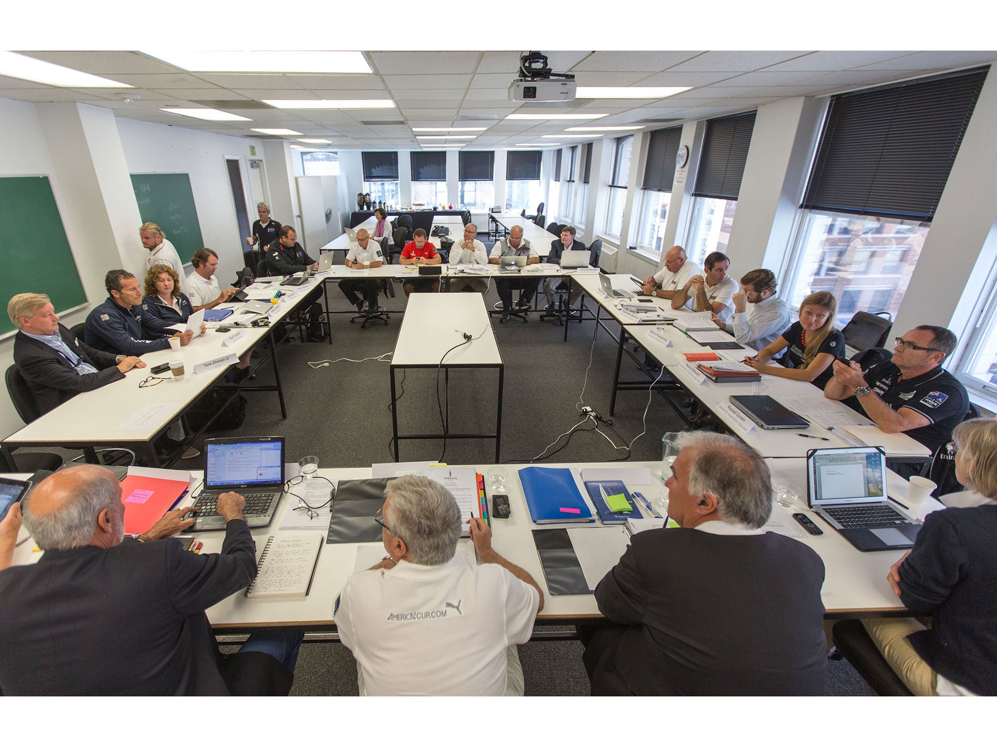 Jury , foreground left to right : Bryan Willis, David Tillett (chairman), John Doerr, Josje Hofland. Missing : Graham McKenzie
Left, and going clockwise: Tom Ehman (Golden Gate Yacht Club), Paul Cayard (Artemis Racing), Melinda Erkelens (AR), Dave Perry (