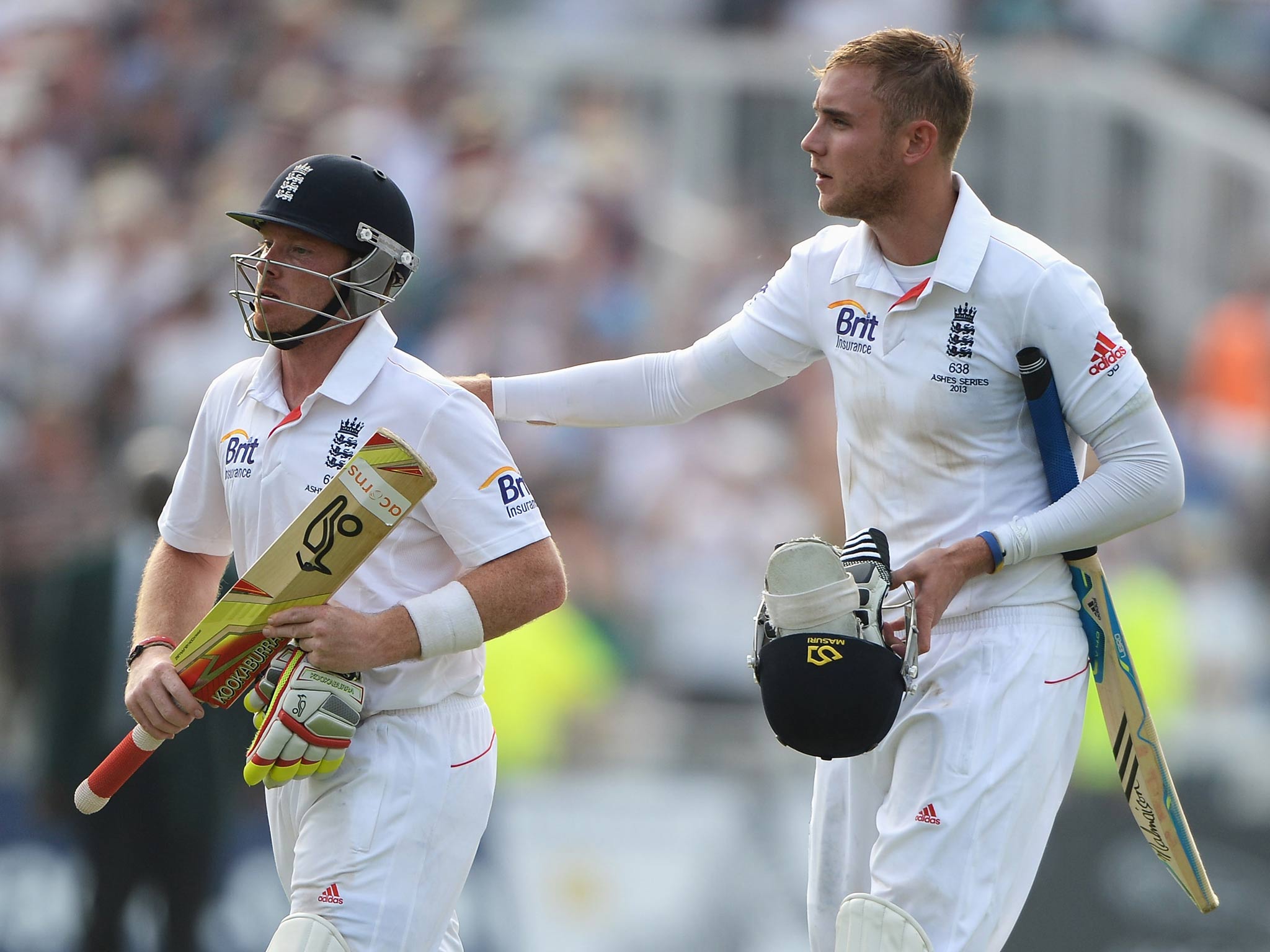 Ian Bell and Stuart Broad leave the field at the end of Day Three