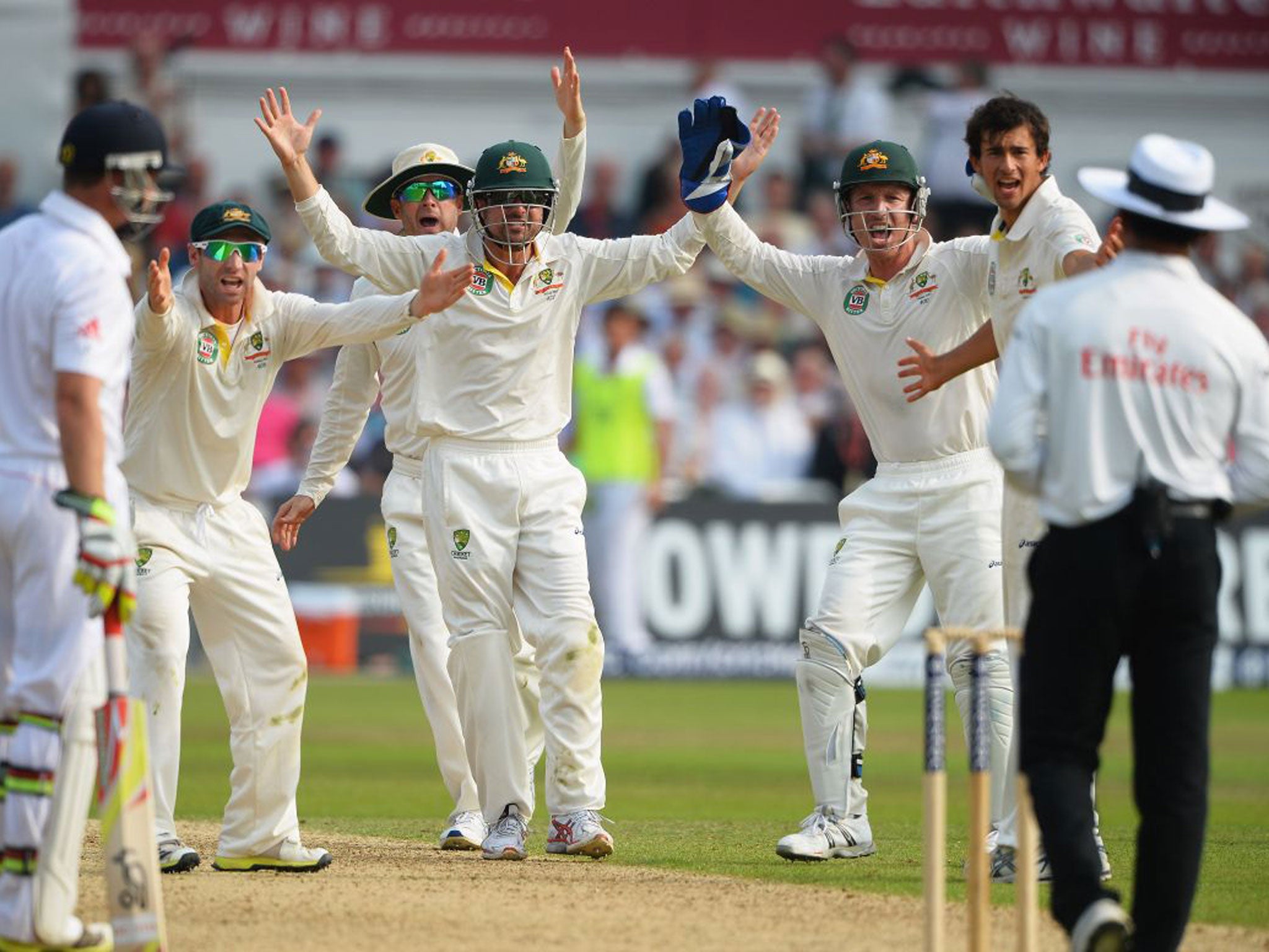 The Australian players are incredulous as Stuart Broad, who clearly hit the ball (far left), refuses to walk and is given not out