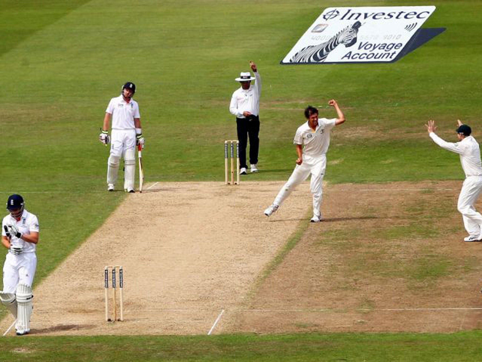 The Australians celebrate dismissing Jonny Bairstow yesterday