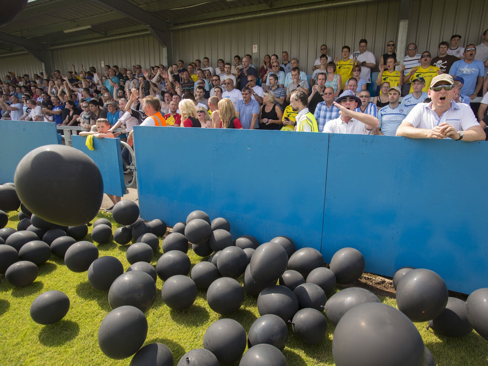 Black balled: More than 700 Coventry fans at City’s match at Nuneaton protest over the proposed ground share