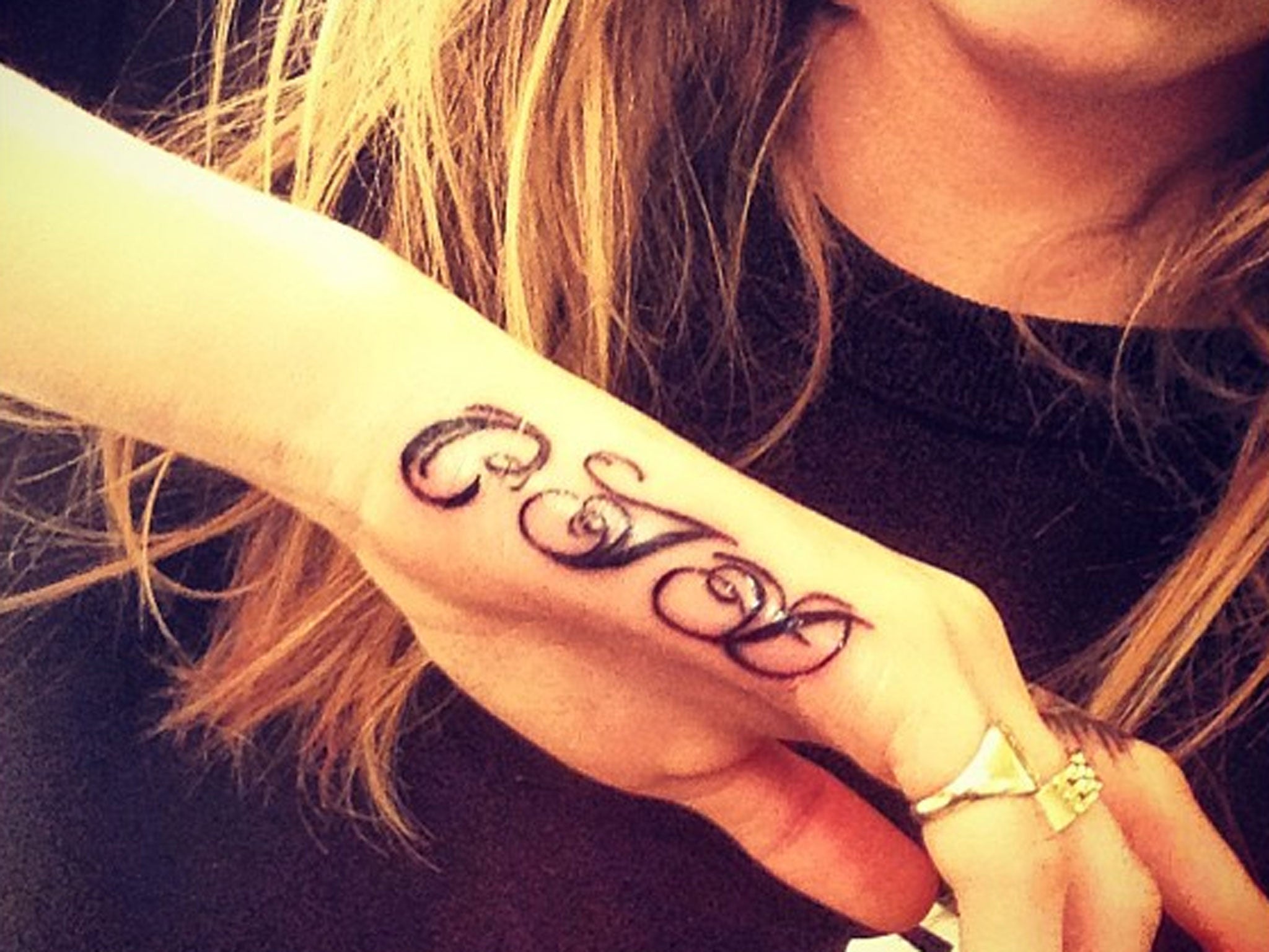 Cara Delevingne's second tattoo: her initials CJD (Cara Jocelyn Delevingne)