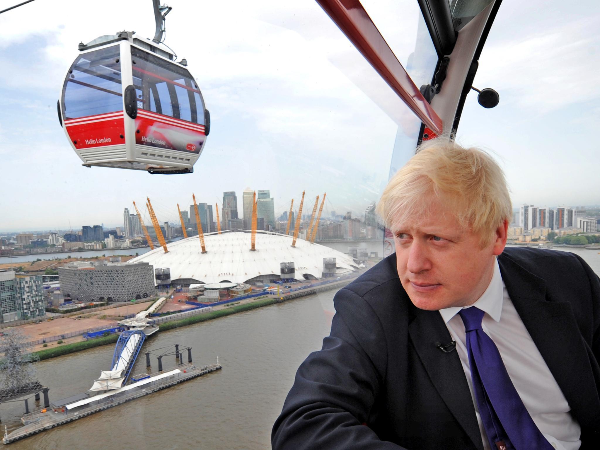 Boris Johnson taking one of the first rides on the Emirates Air Line last year