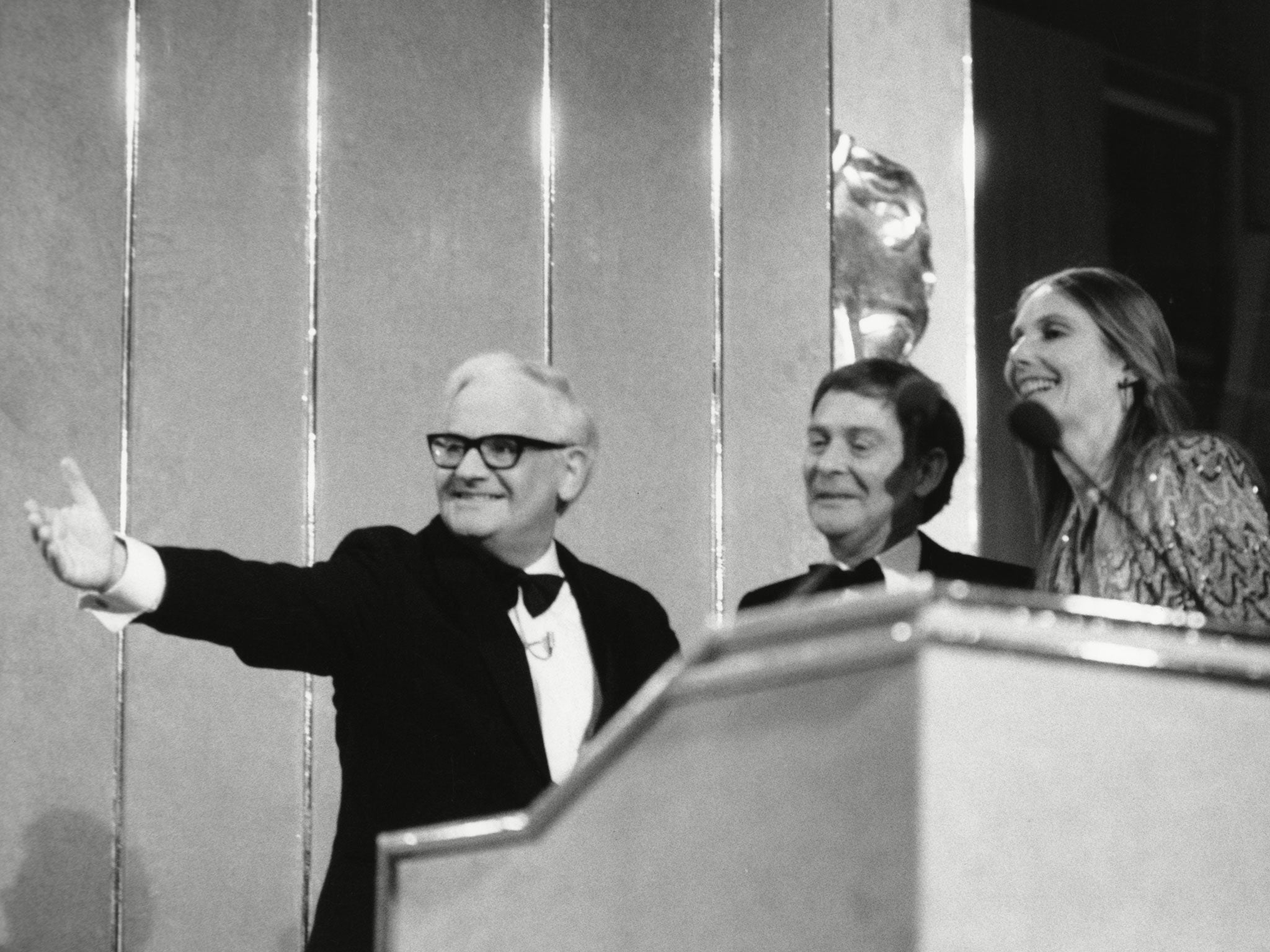 Butt, centre, with production manager Sue Bysh, receives a Bafta from Ronnie Barker for ‘Just Good Friends’ in 1987