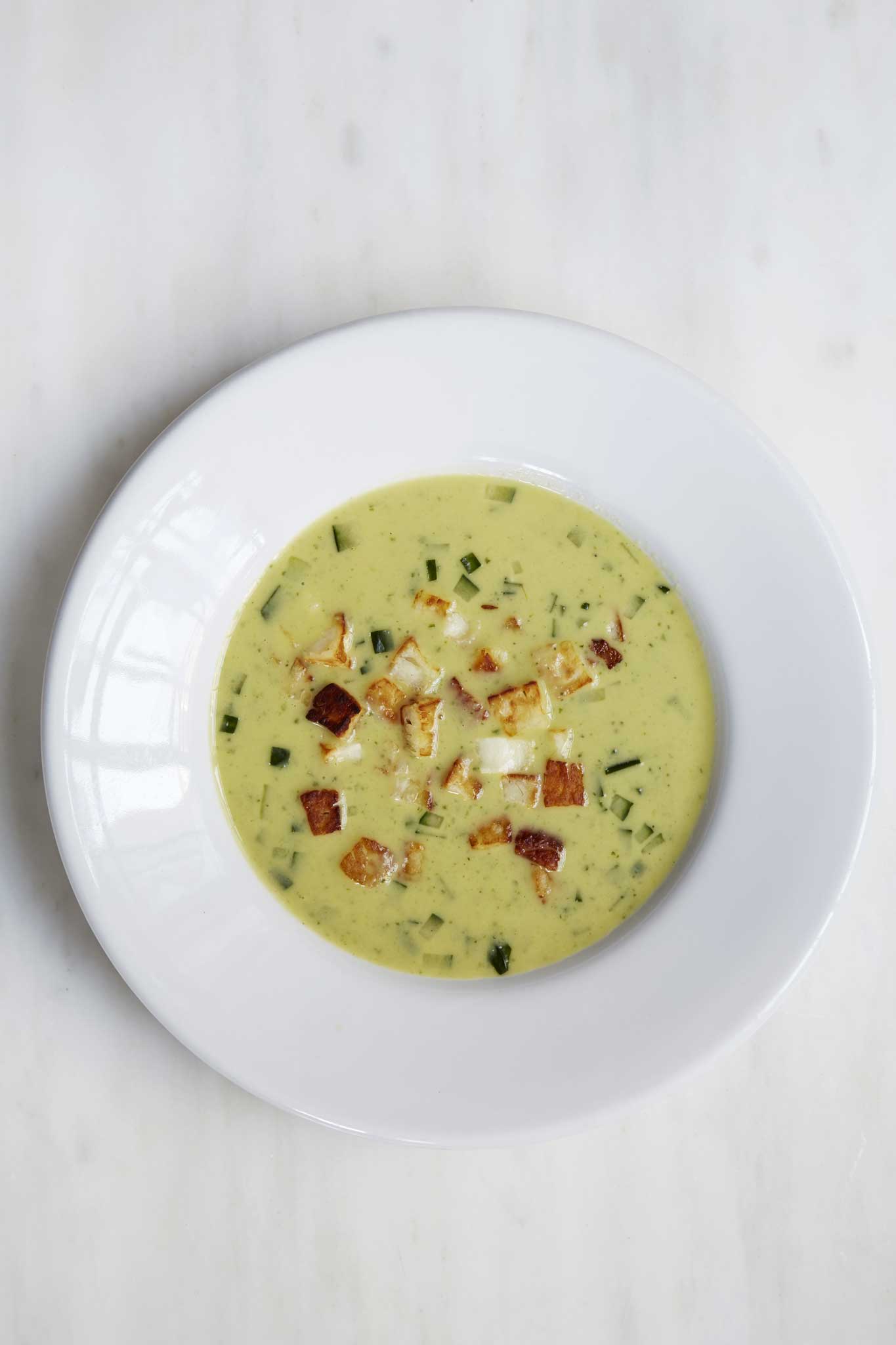 Cucumber and lovage soup with crispy haloumi