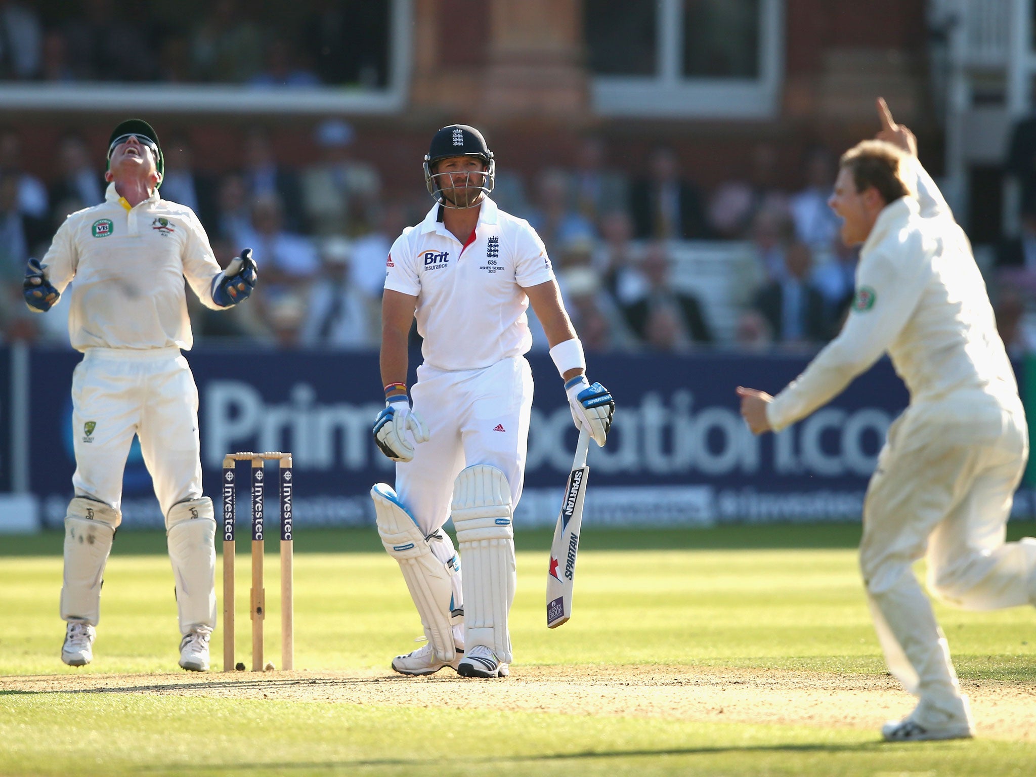 Steve Smith (right) celebrates Matt Prior’s wicket, one of three he took late yesterday for Australia