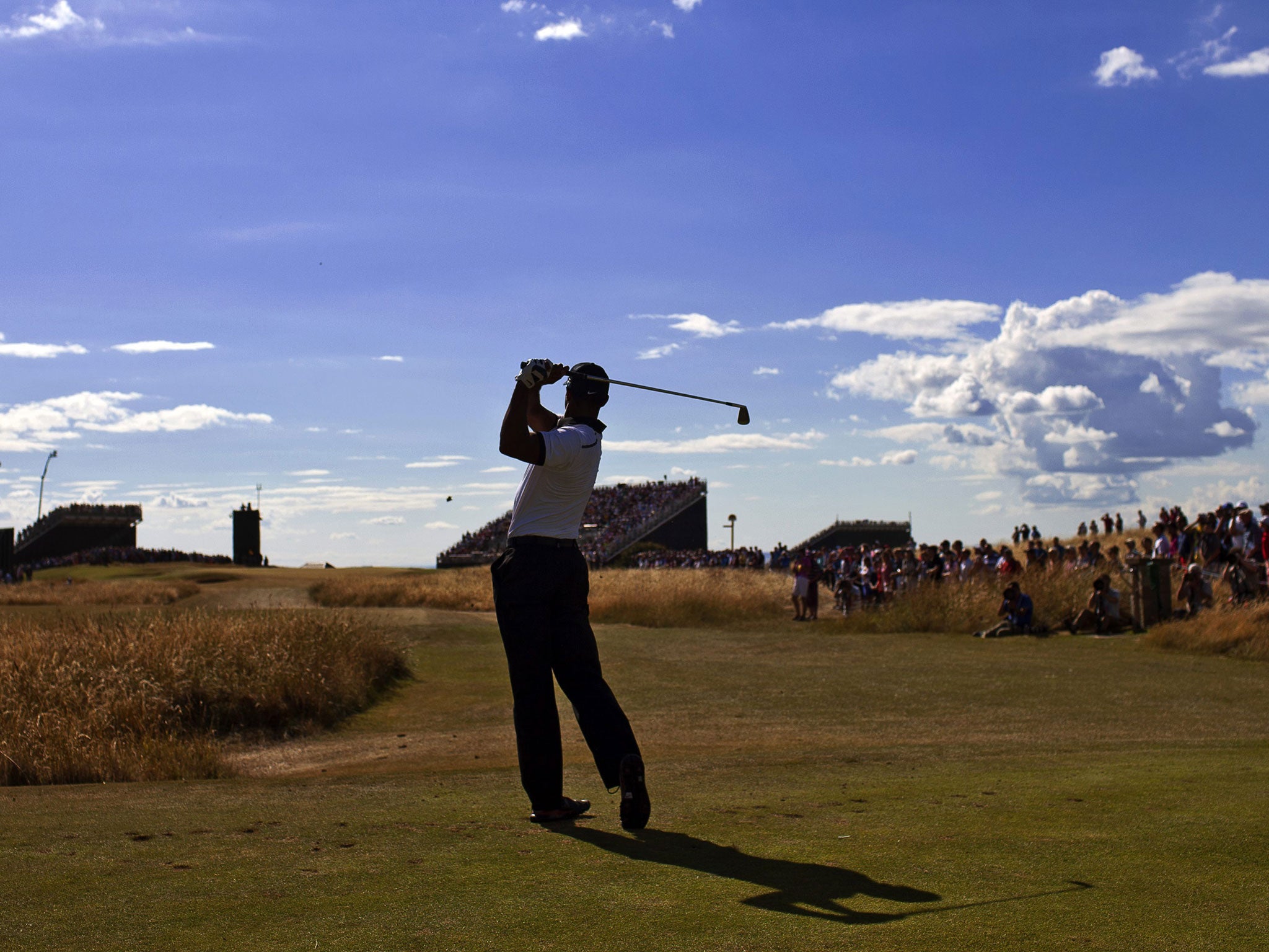 US golfer Tiger Woods tees off at 7th during the first day of the British Open Golf Championship at Muirfield golf course in Gullane, Scotland
