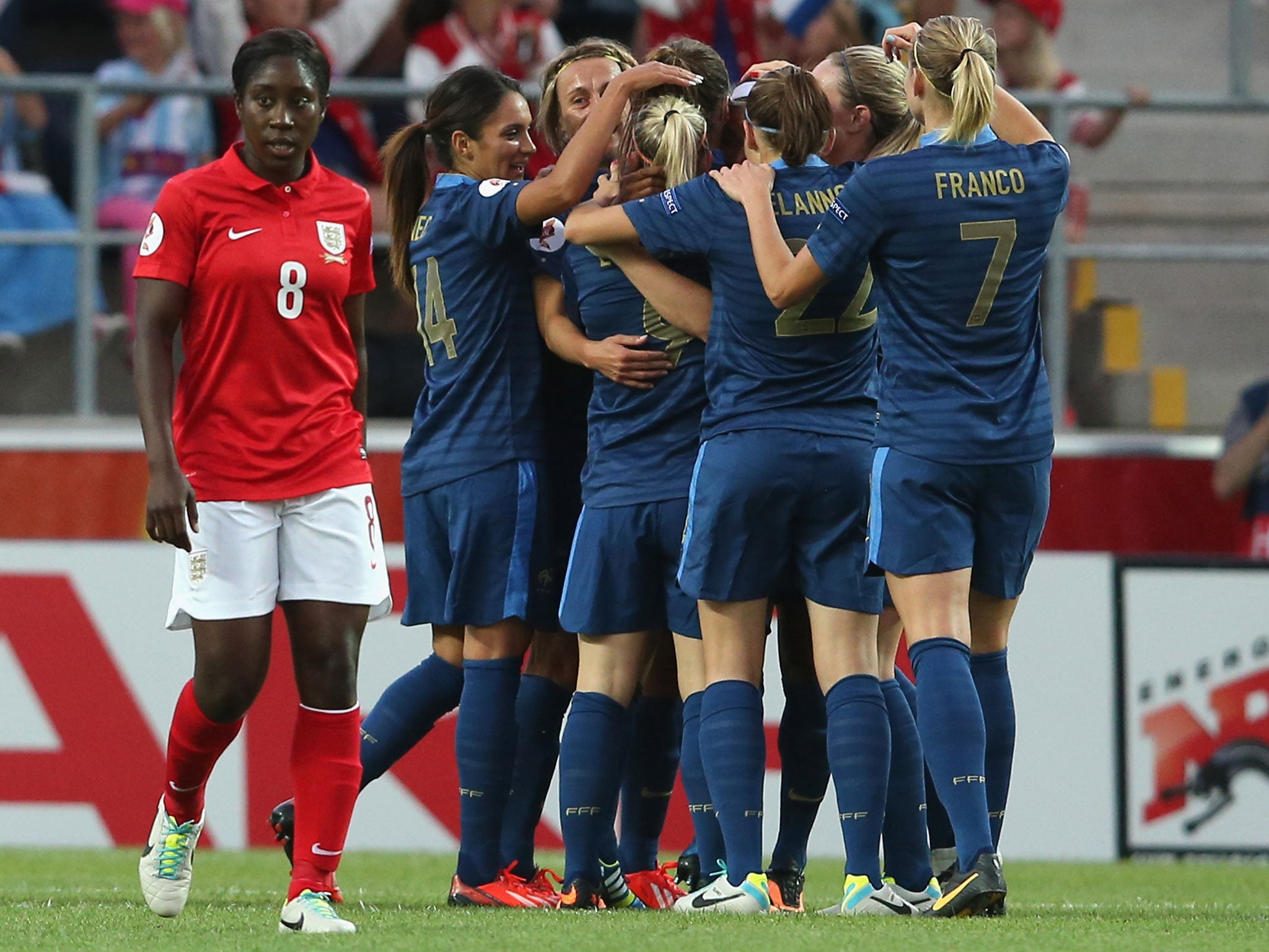 England’s Anita Asante (left) cannot look as France celebrate their first goal