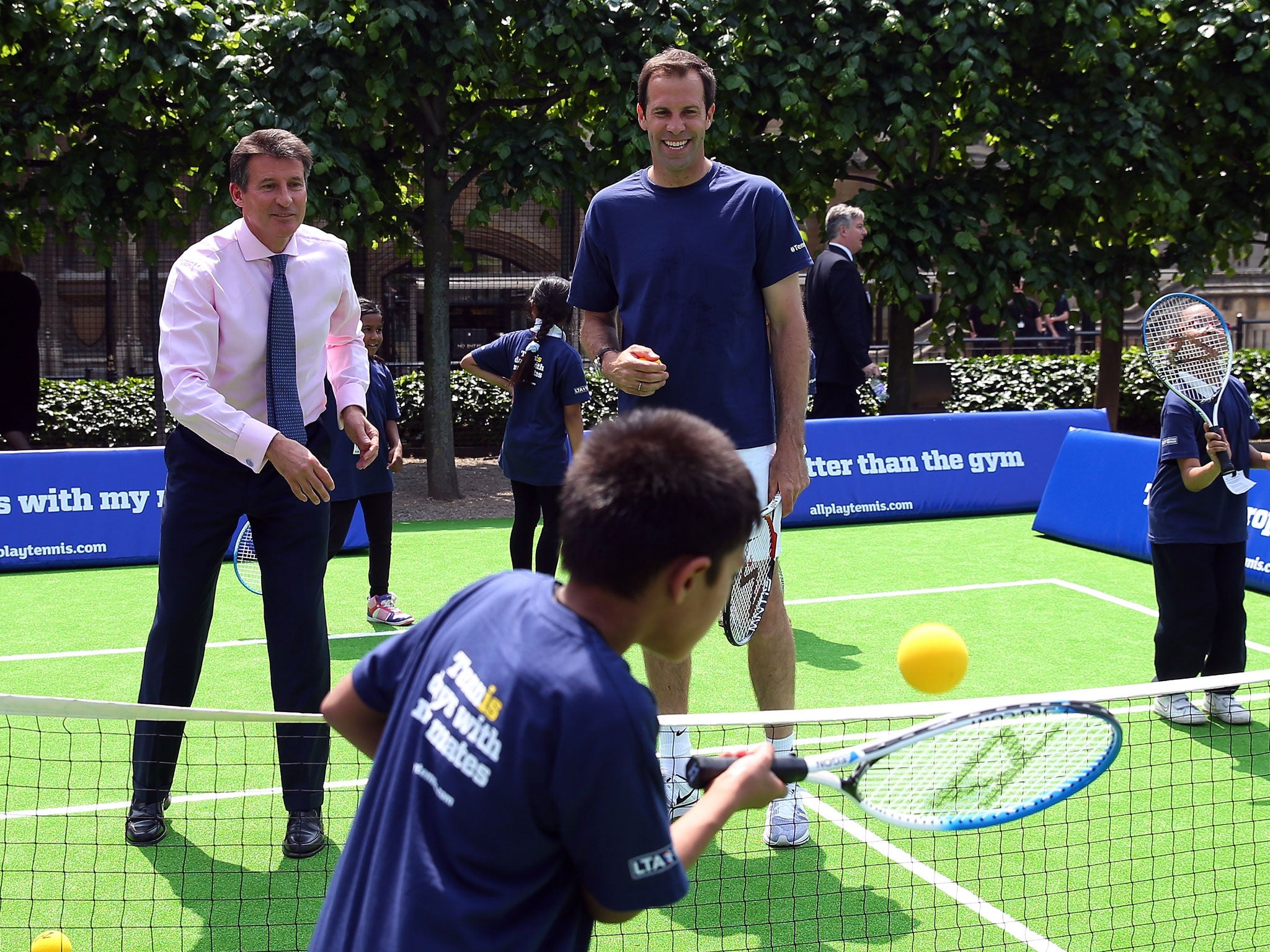 Pulling strings: Lord Coe (left with Greg Rusedski) says Andy Murray’s Wimbledon win has done more for the sport than the Lawn Tennis Association have ever done