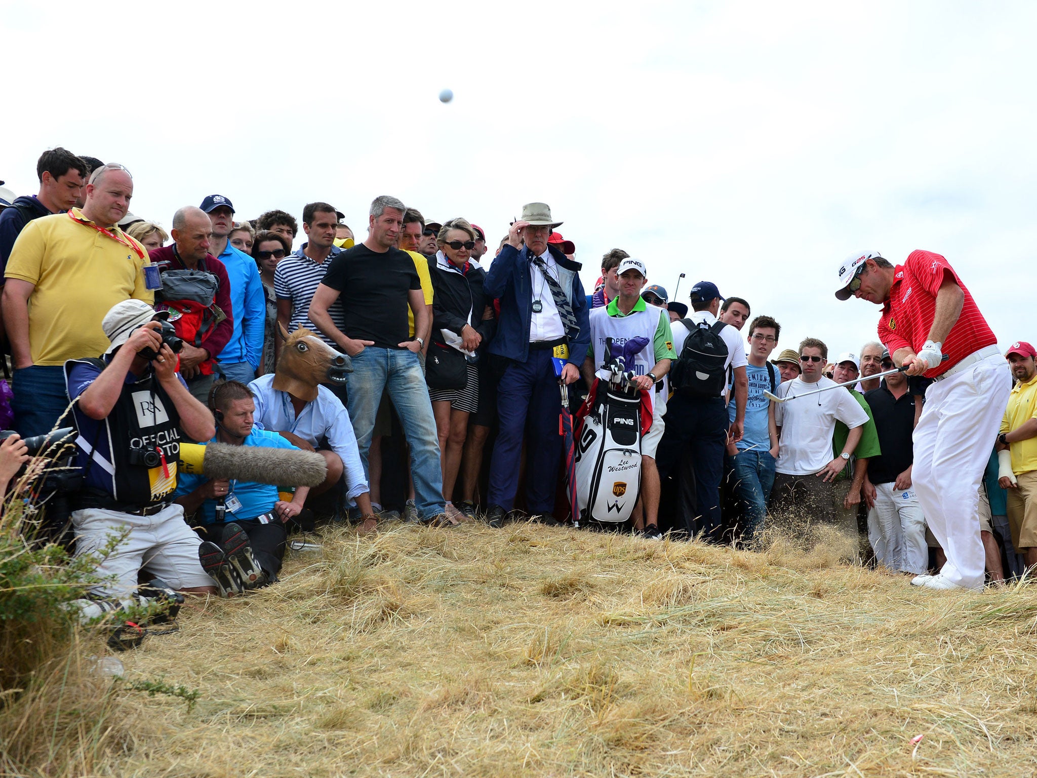 Lee Westwood plays out of the rough on his way to a four-over-par final round as he slipped from first to a tie for third