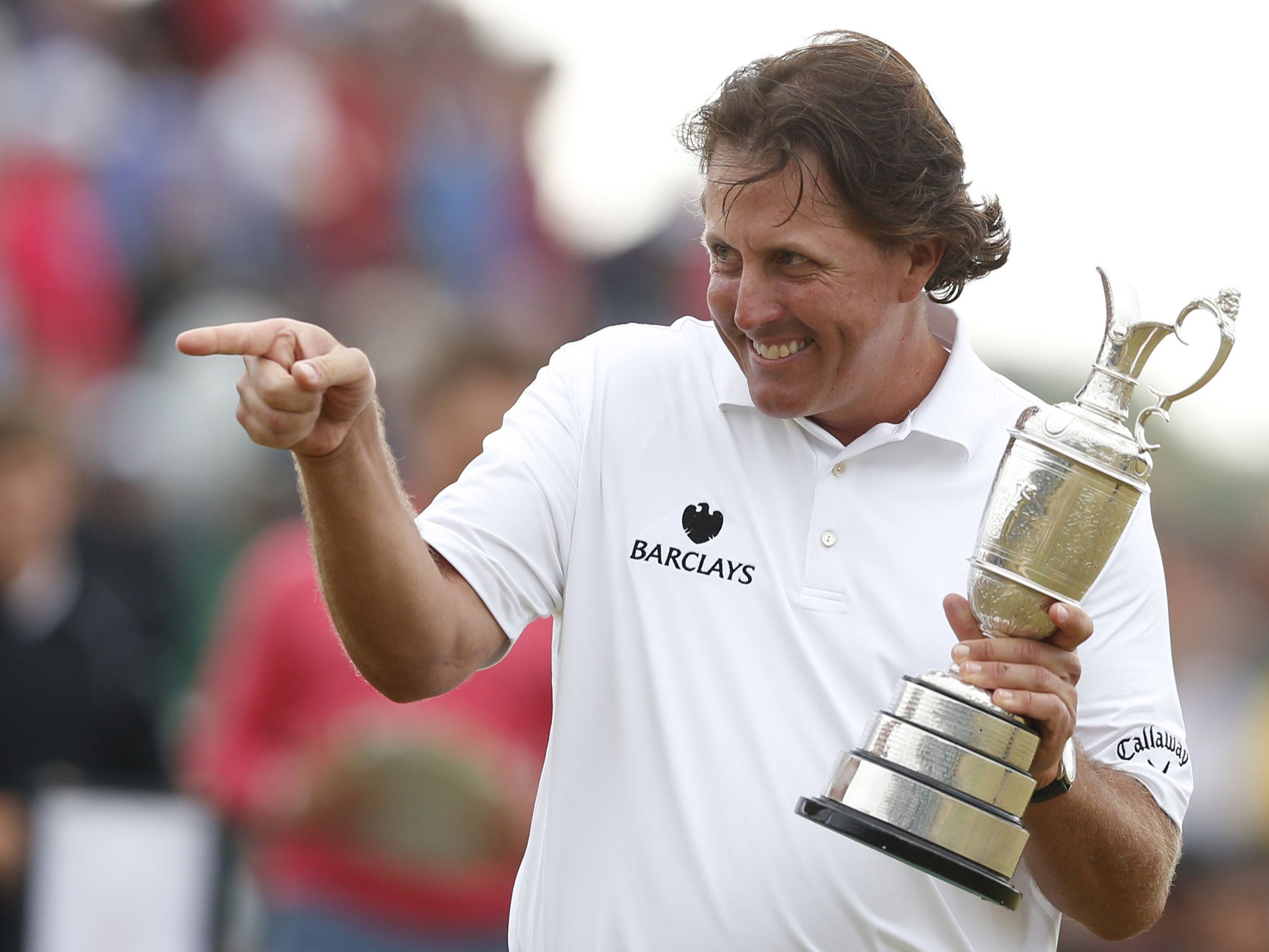 Phil Mickelson celebrates with the Claret Jug