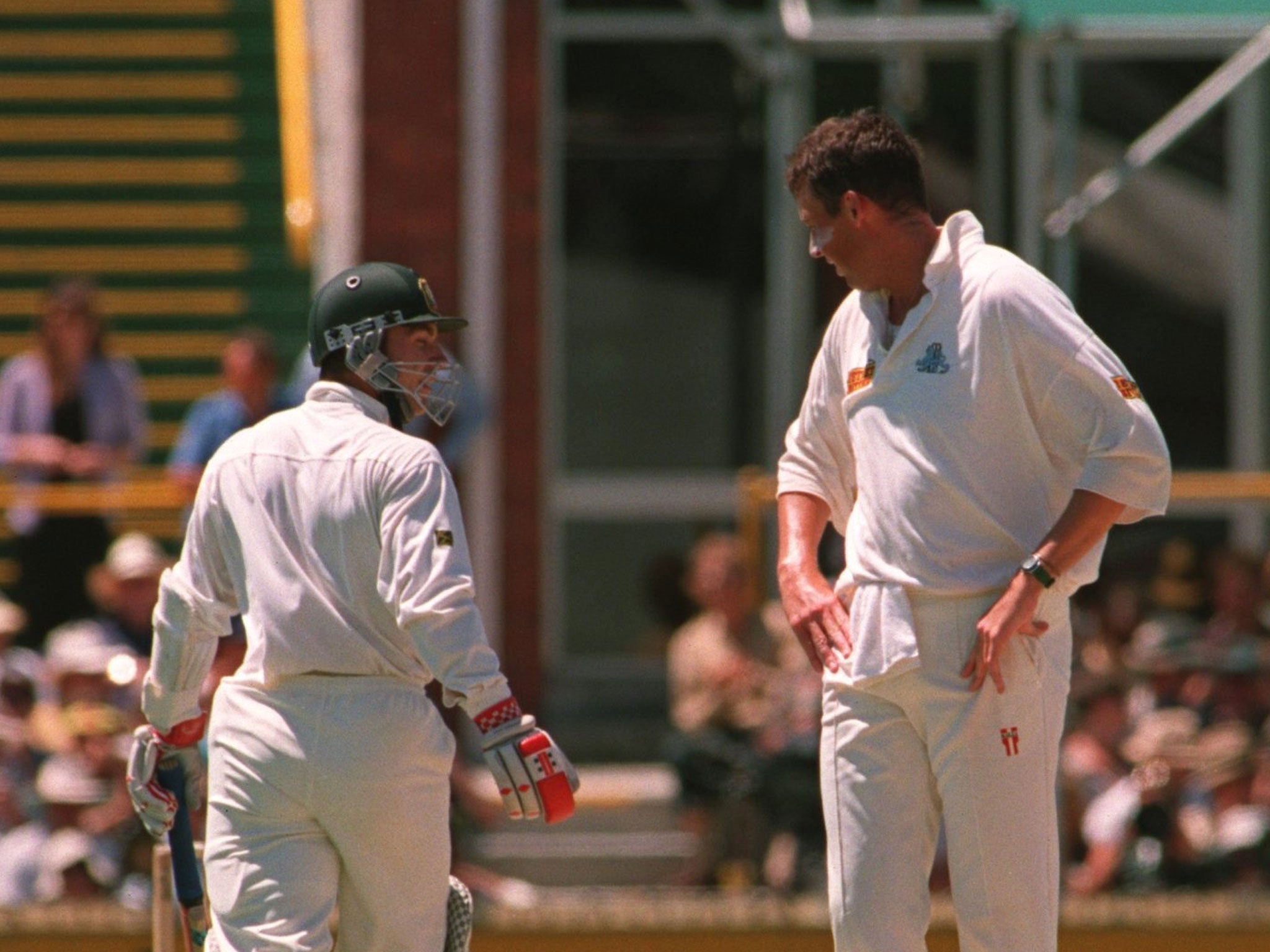 England’s Angus Fraser speaks to Michael Slater on the pitch in Western Australia in 1995