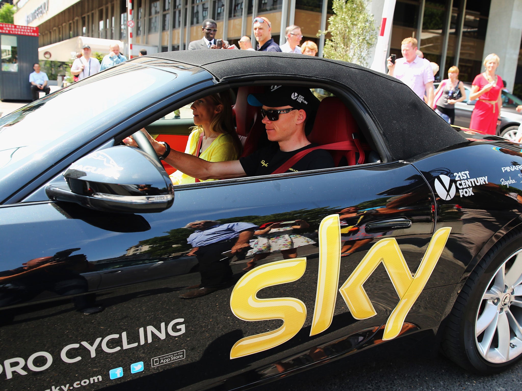 Tour de France winner Chris Froome goes from two wheels to four