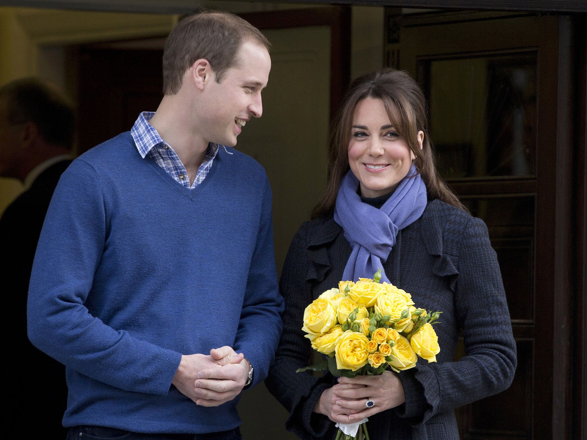 6 December, 2012: Prince William stands next to his wife Kate, Duchess of Cambridge as she leaves the King Edward VII hospital in central London