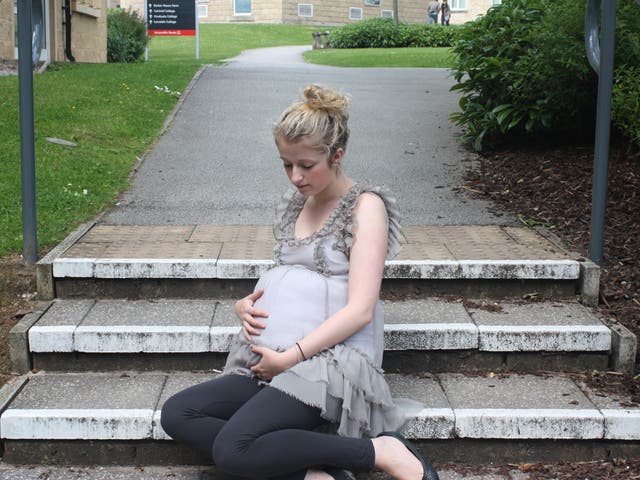 Ellie House sports her fake bump 