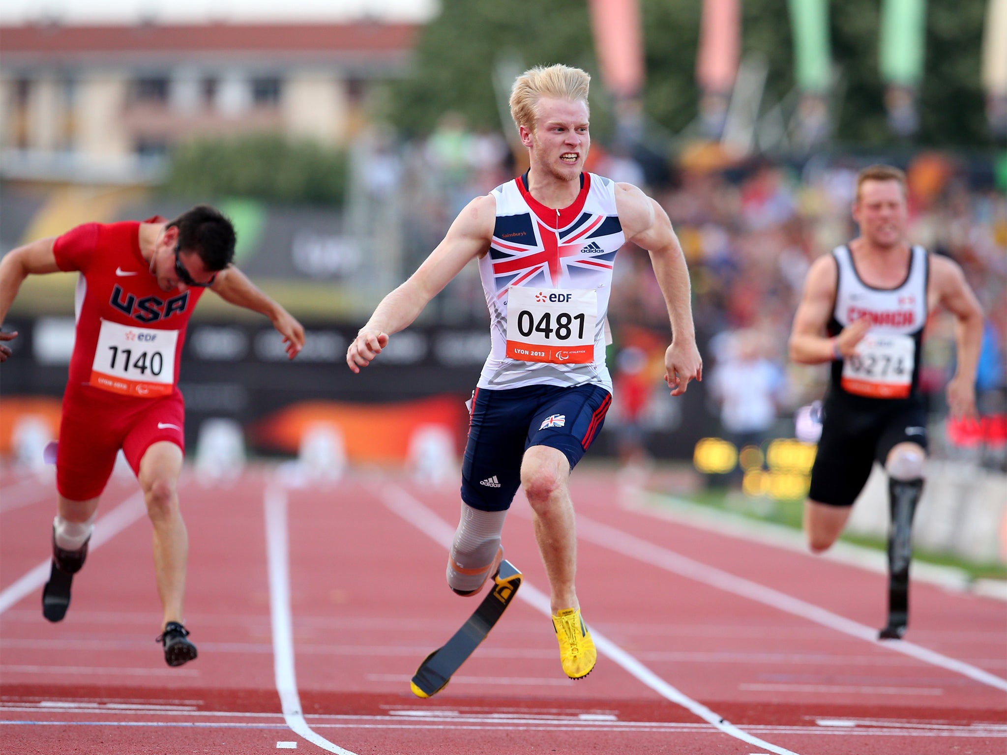 Jonnie Peacock crosses the finish line to win the T44 100m